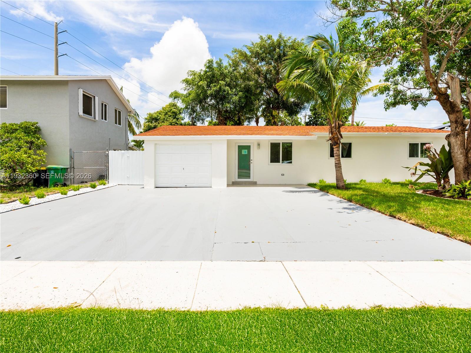 Impressive exterior facade at 254 4th St - Home in Dania Beach
