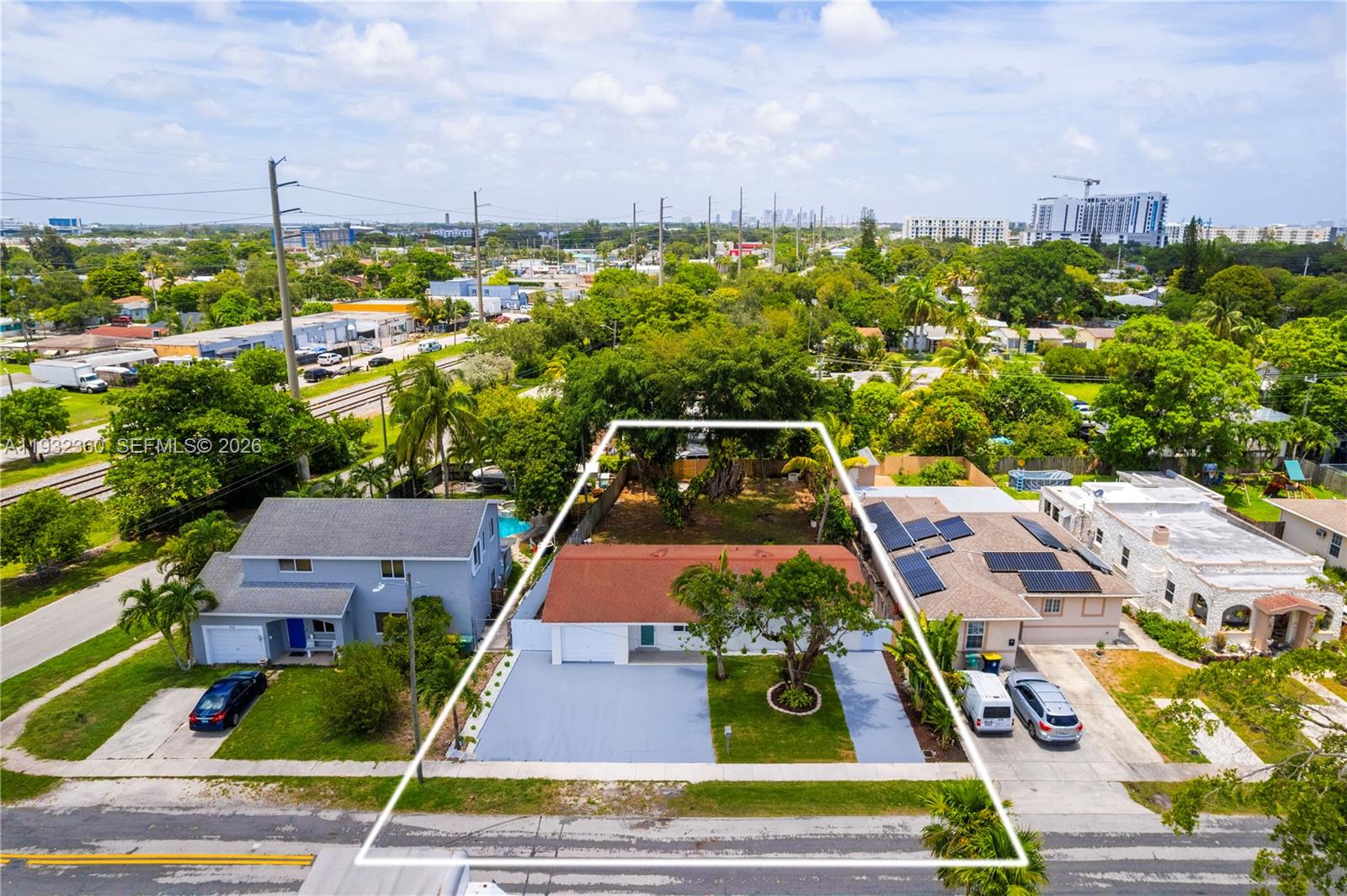 Open-concept living area at 254 4th St - Home in Dania Beach