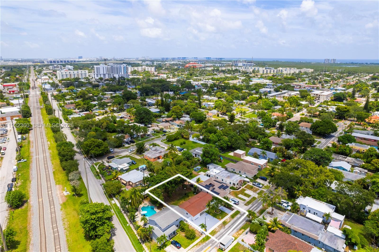 Modern kitchen with designer features at 254 4th St - Home in Dania Beach