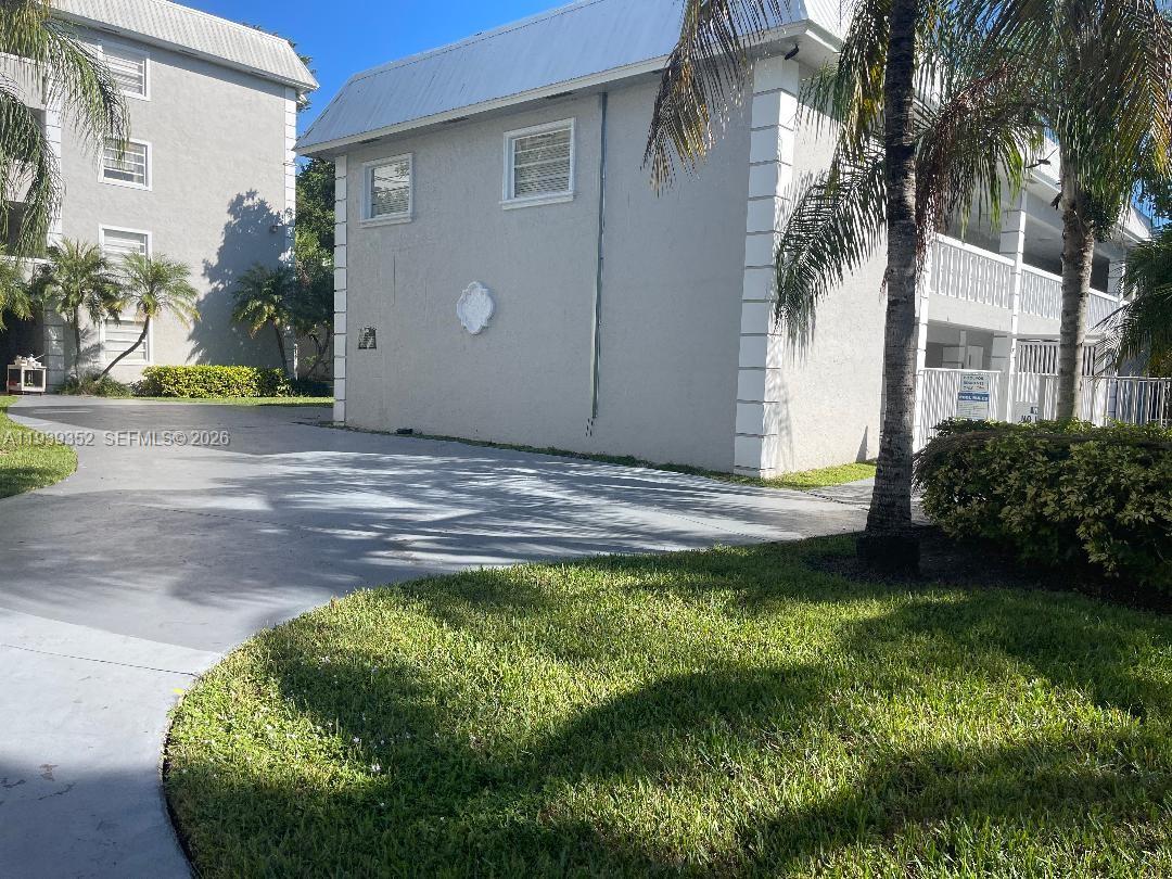 Spacious first floor corner unit with plenty of light. Includes one assigned parking space.  Pool, clubhouse, playground, gated community. Only steps from US-1.