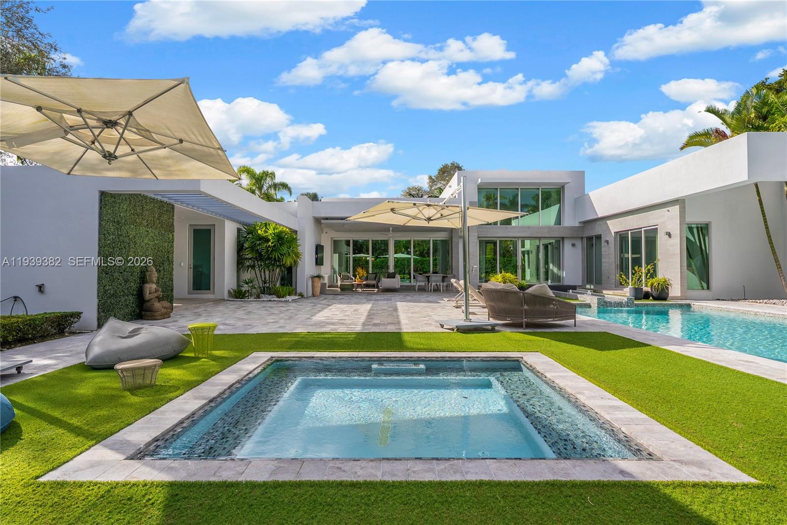 Exceptional North Pinecrest Estate | Private, Refined, and Move-In ReadyNestled on a quiet cul-de-sac in the highly sought-after North Pinecrest neighborhood, this beautifully designed one-story estate offers a rare combination of privacy, scale, and timeless sophistication. Set on a lush acre, the residence is thoughtfully crafted for both everyday living and effortless entertaining.The home features 7 spacious bedrooms and 8 bathrooms, with soaring ceilings and an abundance of natural light throughout. Expansive living areas flow seamlessly into a resort-style outdoor setting, where a stunning pool, jacuzzi, and summer kitchen create the perfect backdrop for gatherings or quiet relaxation.A well-appointed kitchen, generous family and formal spaces, and multiple access points to the outdoors enhance the home’s functionality and livability. The primary suite offers a serene retreat with oversized walk-in closets and a spa-inspired bath.Additional highlights include a 2-car garage, ample driveway parking, and a prime location within one of Miami’s top school districts, just minutes from elite schools, parks, and key thoroughfares.A rare opportunity to own a private estate in one of Pinecrest’s most desirable enclaves.