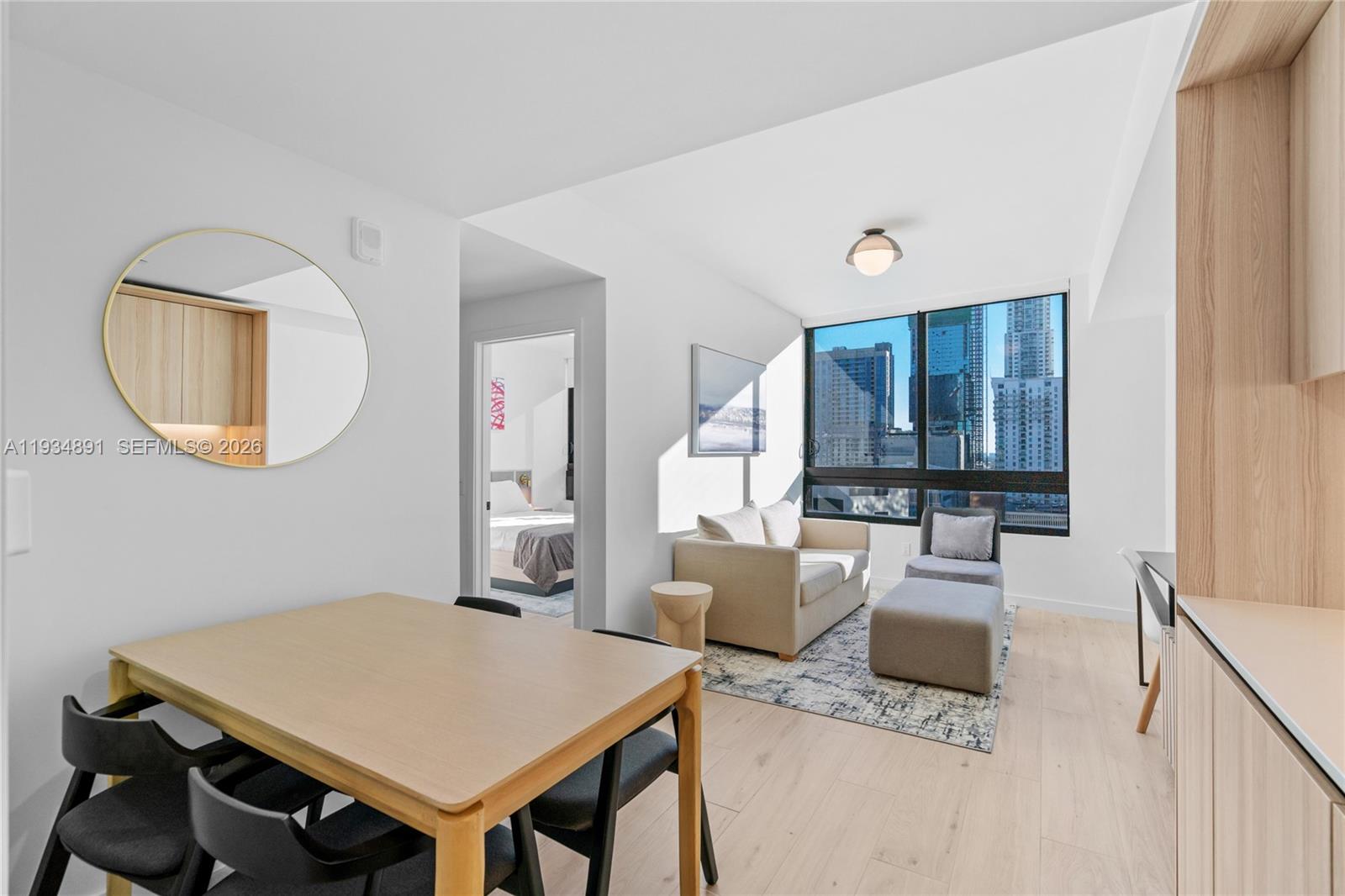 District 225 is a new construction building. This 2-bedroom is the largest floor plan in the building and features 884 SF of interior space, comes fully furnished with smart-home technology, and interiors by Meshberg Design. Includes fully built-out closets, integrated A/V, contemporary lighting, Italian kitchen cabinetry, top of the line appliances, top-of-the-line W/D, and Dornbracht & Duravit bath fixtures. Enjoy downtown Miami views. Resort-style amenities include swim spa, summer kitchen, rock climbing wall, full-height basketball & racquetball courts, fitness center, yoga studio, café, valet, on-demand housekeeping, e-bike charging, and 24/7 security. Prime Downtown location near Miami World Center, Bayfront Park, and Miami Dade College.