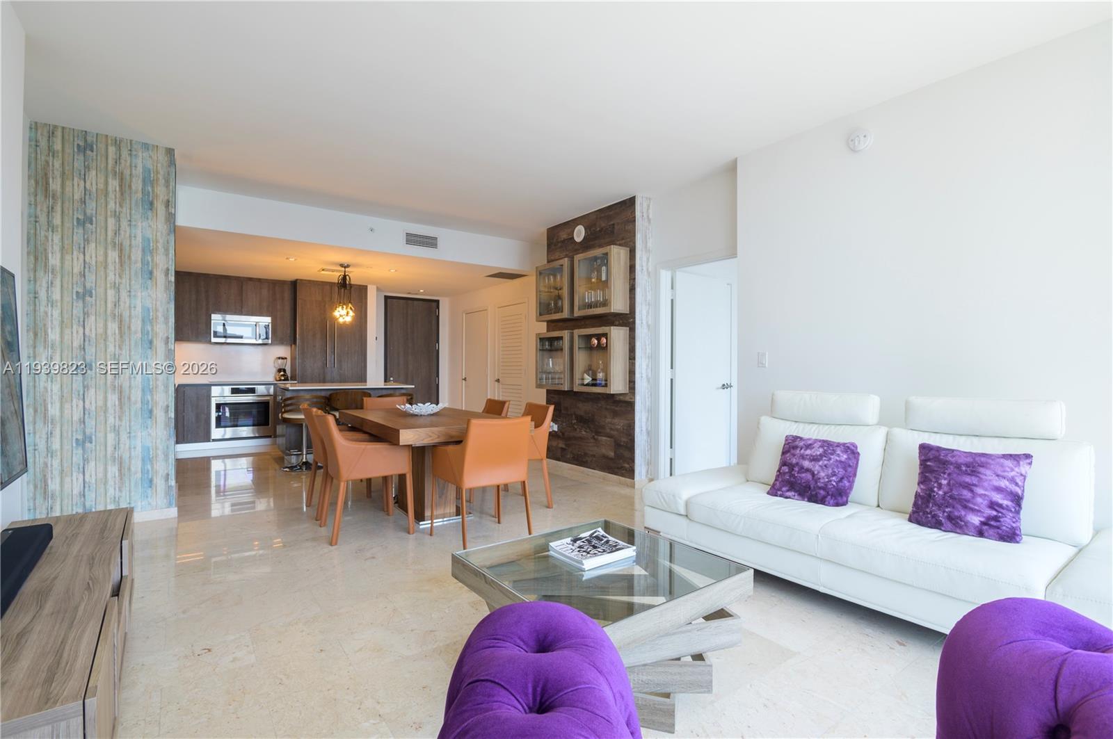 Modern Italian cabinetry for both kitchen and Bathroom, Bosh appliances, wine cooler , marble floors, Building amenities included exercise room, Tea Lounge, Concierge and Gallery, pool, party room, Children’s playroom, deck, spa and many more, restaurants & movie theaters, Basic cable/Internet all those included by condo association.