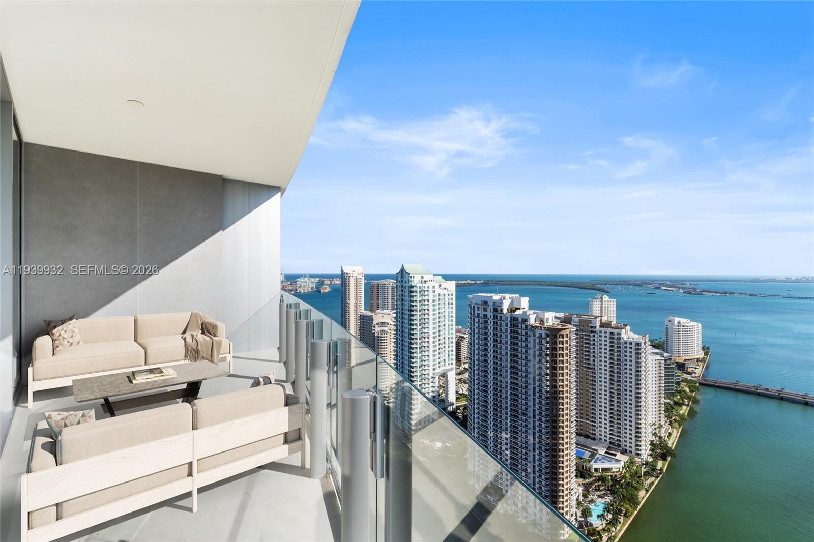 Stunning 3-bedroom, 3.5-bath residence on the 42nd floor with breathtaking panoramic views of the Miami skyline and Miami River. Located in an iconic, luxury tower in a prime location, this home showcases impeccable craftsmanship, floor-to-ceiling impact glass, and exquisite marble finishes throughout. The open living and dining areas are perfect for entertaining and highlight dramatic city views.Residents enjoy world-class amenities, including a resort-style pool deck, two-level state-of-the-art fitness center, lavish spa, indoor pool, private theaters, art gallery, and Butler Concierge Services. Experience unparalleled luxury living in one of Miami’s most coveted addresses.