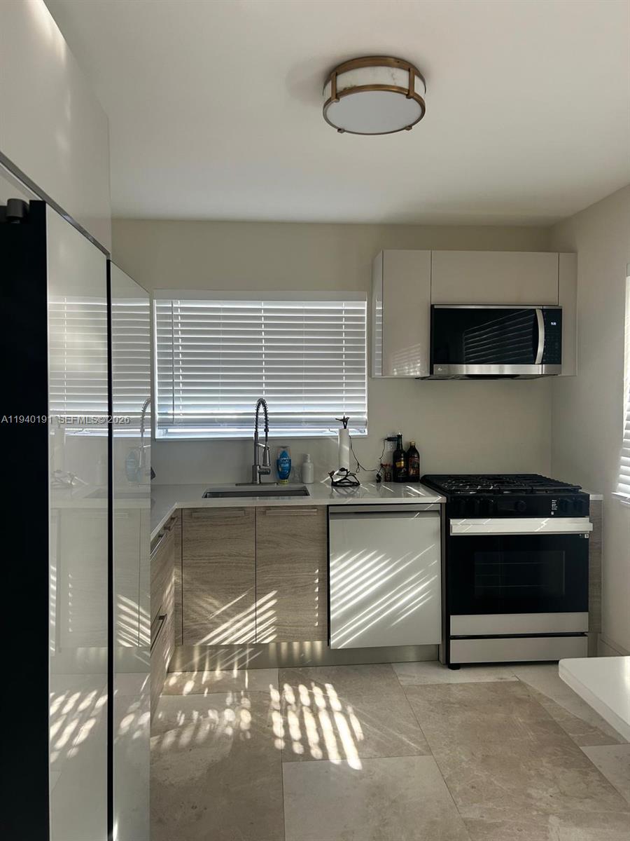 Well-appointed guest bedroom at 1060 92nd - Condo in Bay Harbor Islands