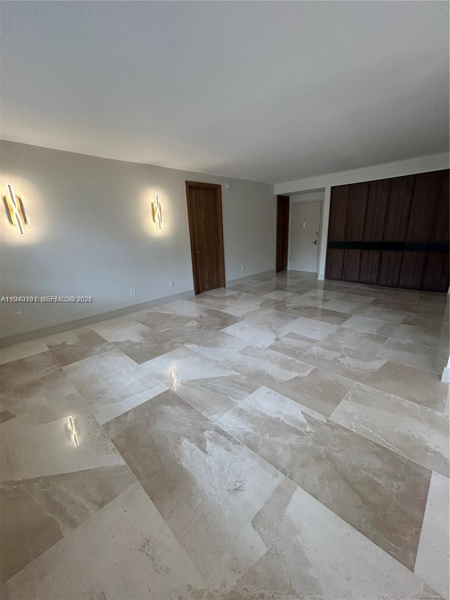 Open-concept living area at 1060 92nd - Condo in Bay Harbor Islands