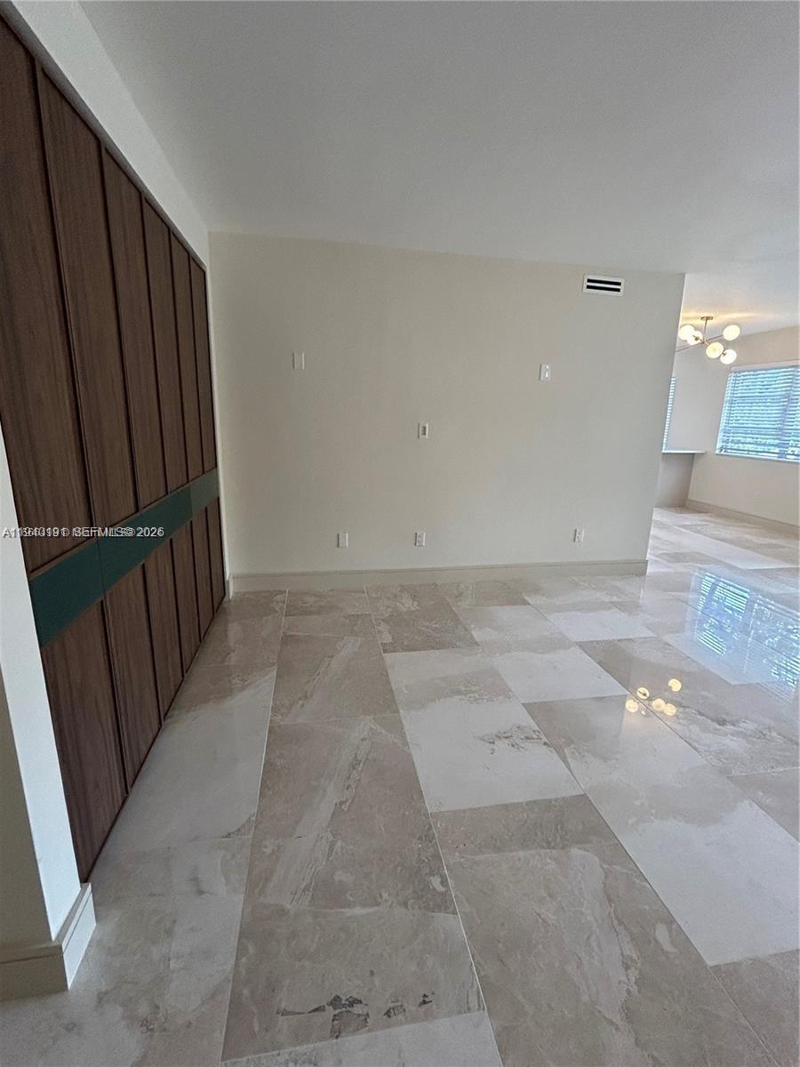 Modern kitchen with designer features at 1060 92nd - Condo in Bay Harbor Islands
