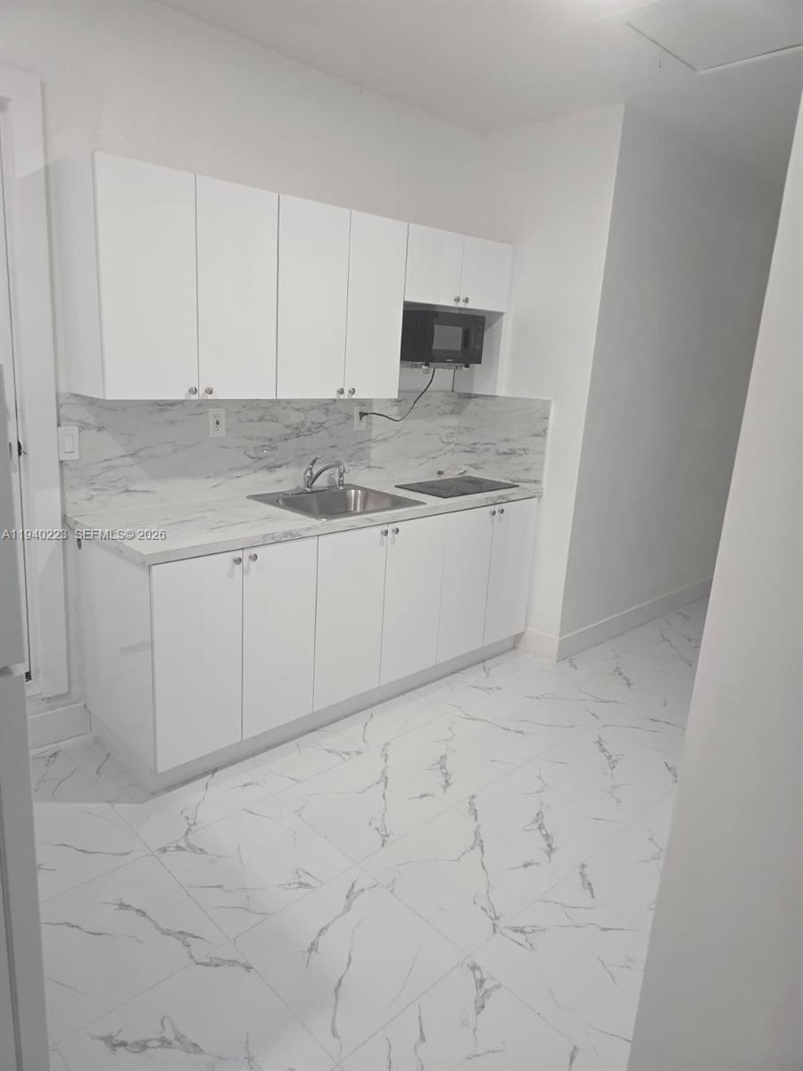 Cozy and efficient, this brand-new apartment is ideally located in the heart of Cutler Bay, within walking distance to the middle school and just minutes from the Turnpike and US-1. Never lived in, the unit features ceramic tile flooring throughout, impact windows and doors, and a private entrance. Enjoy a modern kitchen with all-new appliances and a new mini-split air conditioning system. Completely updated and move-in ready.