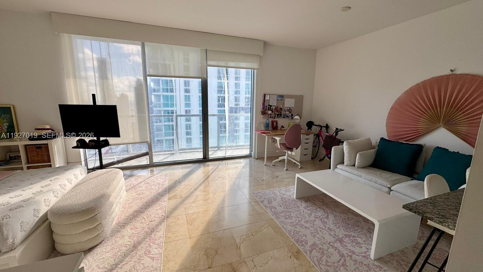 Spacious and bright studio unit at 1060 BRICKELL, offering the flexibility to rent furnished or unfurnished. Enjoy stunning city and water views from your living space. Includes an assigned parking spot for your convenience. Located in the heart of Brickell, just steps from top restaurants, shopping, and entertainment. This luxury building offers a full suite of amenities including 24-hour concierge, state-of-the-art fitness center, pool, spa, social lounges, and more. The unit is available at a special discounted rate during pool renovations, providing excellent value while still enjoying most amenities. Once renovations are complete, residents will have full access to all building features. Ideal for professionals or anyone seeking a premier Miami lifestyle, this unit combines comfort, convenience, and sophistication. Don’t miss the chance to live in one of the city’s most dynamic neighborhoods with everything Miami has to offer right at your doorstep. Flexible rental terms and easy move-in make this an exceptional opportunity in Brickell’s vibrant luxury market.