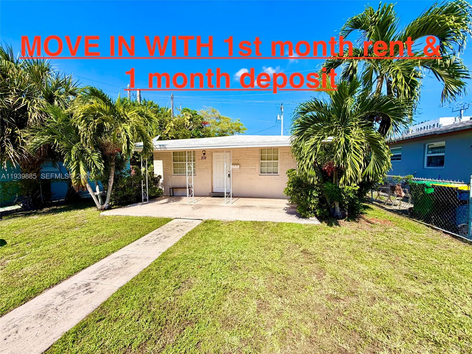Impressive exterior facade at 212 2nd Ter - Home in Dania Beach