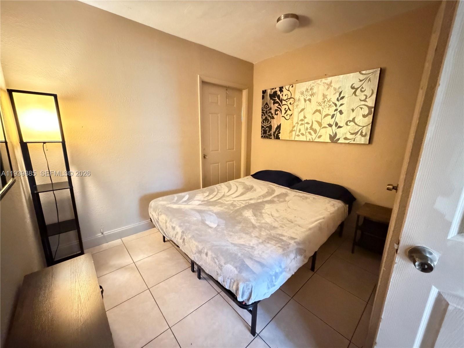Elegant master bedroom retreat at 212 2nd Ter - Home in Dania Beach