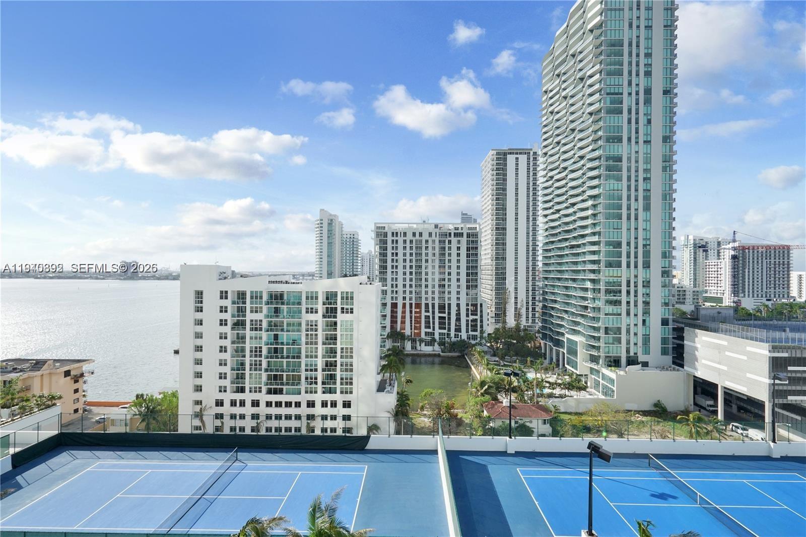 NEWLY PRICED | RARE 2 PARKING SPACES IN EDGEWATERBest value in Platinum Condominium. This 14th floor 2BR/2BA split floor plan features floor to ceiling impact glass, 10-ft ceilings, and a spacious balcony accessible from every room with open skyline views.Includes TWO assigned covered parking spaces, a rare and highly valuable feature in this corridor.Boutique 119 unit building with remodeled pool, fitness center, sauna, and 24-hour concierge. Walk to Design District, Midtown, and Wynwood.