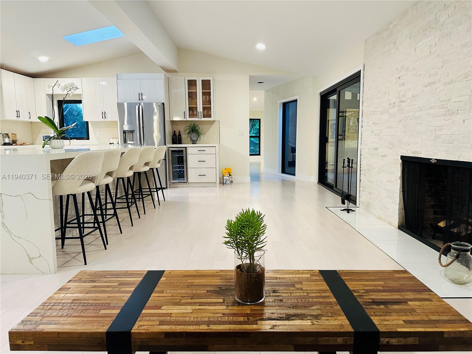 Nestled in nature along a private street you will find this beautifully designed home. Its architectural design is as  beautiful as it is brilliant for on a breezy day its cross ventilation allows for cooling without air conditioning. The home has excellent natural lighting. It is both elegant and warm in its style. For those who enjoy entertaining, it boasts of a 640 square foot kitchen with ample room for everyone to gather around the chef. In addition to large cabinetry you also enjoy a separate pantry for additional storage. Its formal dining room easily seats 8 to10 people.The home may be rented furnished or unfunished. The home has been completely updated while keeping with its original structure.