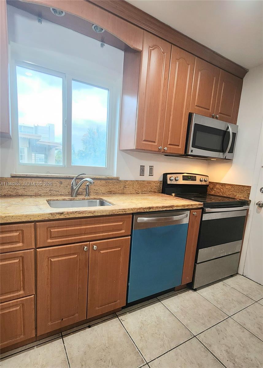 Modern kitchen with designer features at 1020 94th St - Condo in Bay Harbor Islands
