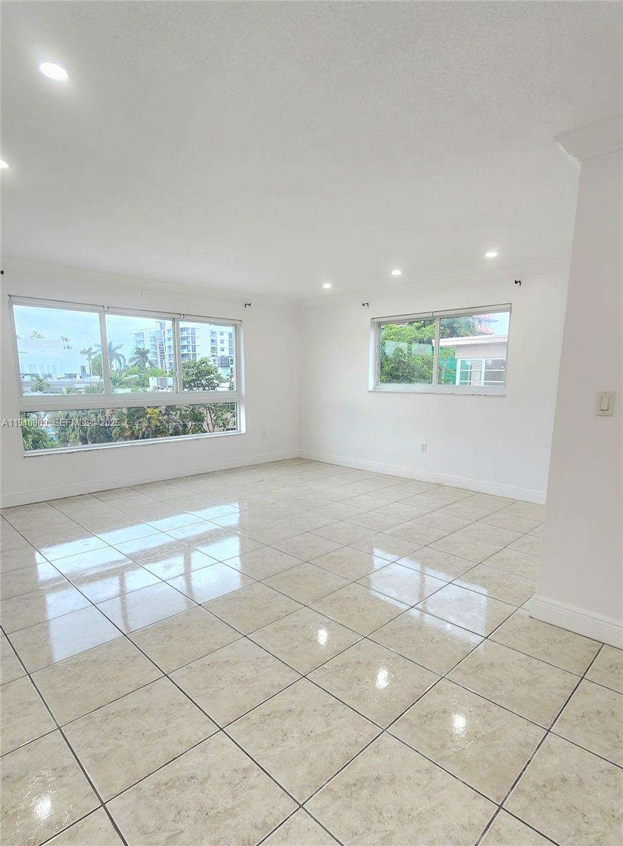Open-concept living area at 1020 94th St - Condo in Bay Harbor Islands