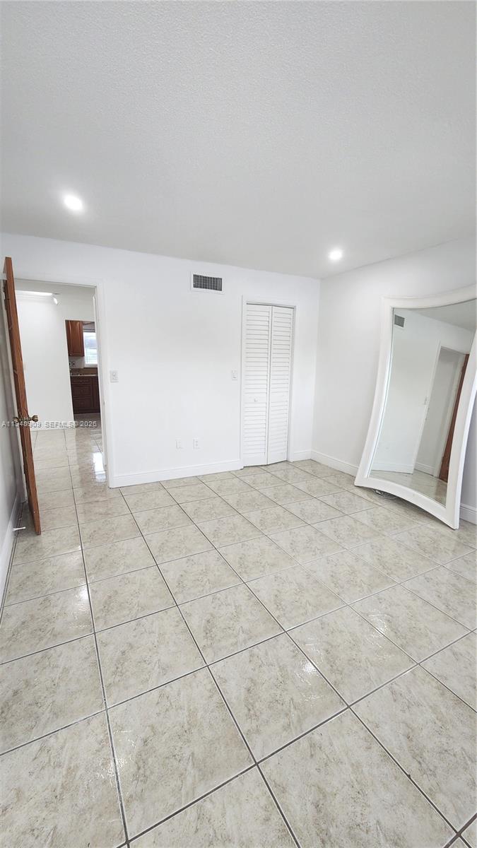 Well-appointed guest bedroom at 1020 94th St - Condo in Bay Harbor Islands