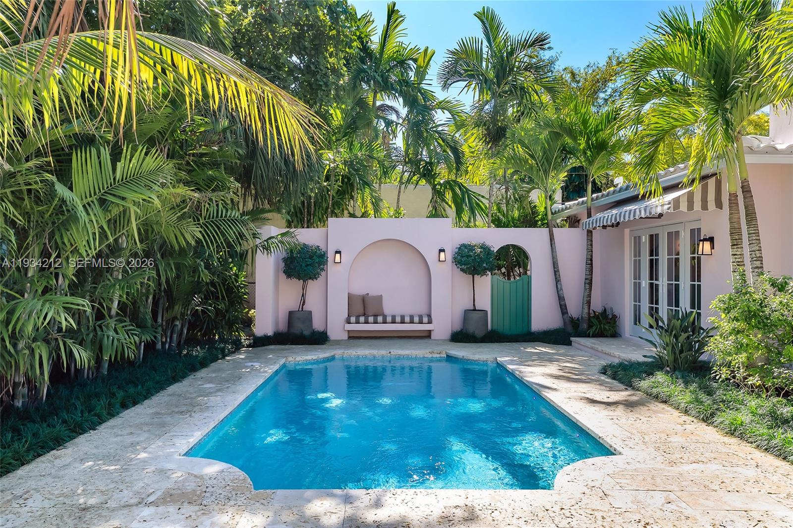 Welcome to Casa Rosada, a fully restored historic residence in the heart of Coral Gables, thoughtfully built and curated by Torre Companies. Located on iconic Madeira Avenue, this 4-bedroom, 3 full and 1 half bath home blends timeless Gables charm with modern sophistication. Set on a 7,250 SF lot with 2,469 SF under air, the residence features an open-plan living and dining area, a spacious family room, and seamless indoor-outdoor flow.The home showcases high-end Italian kitchen and bathroom cabinetry, refined finishes throughout, and a new cement barrel tile roof that honors the home’s historic character while offering modern durability. A boutique-style courtyard and curated landscaping create a private retreat in one of Coral Gables’ most desirable neighborhoods. A rare opportunity to own a thoughtfully restored historic home with the comfort and quality of new construction.