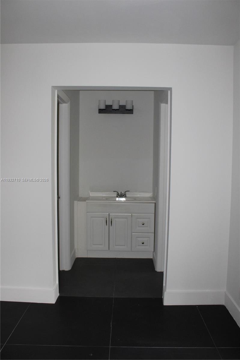 Modern kitchen with designer features at 5140 40th Ave - Condo in Dania Beach