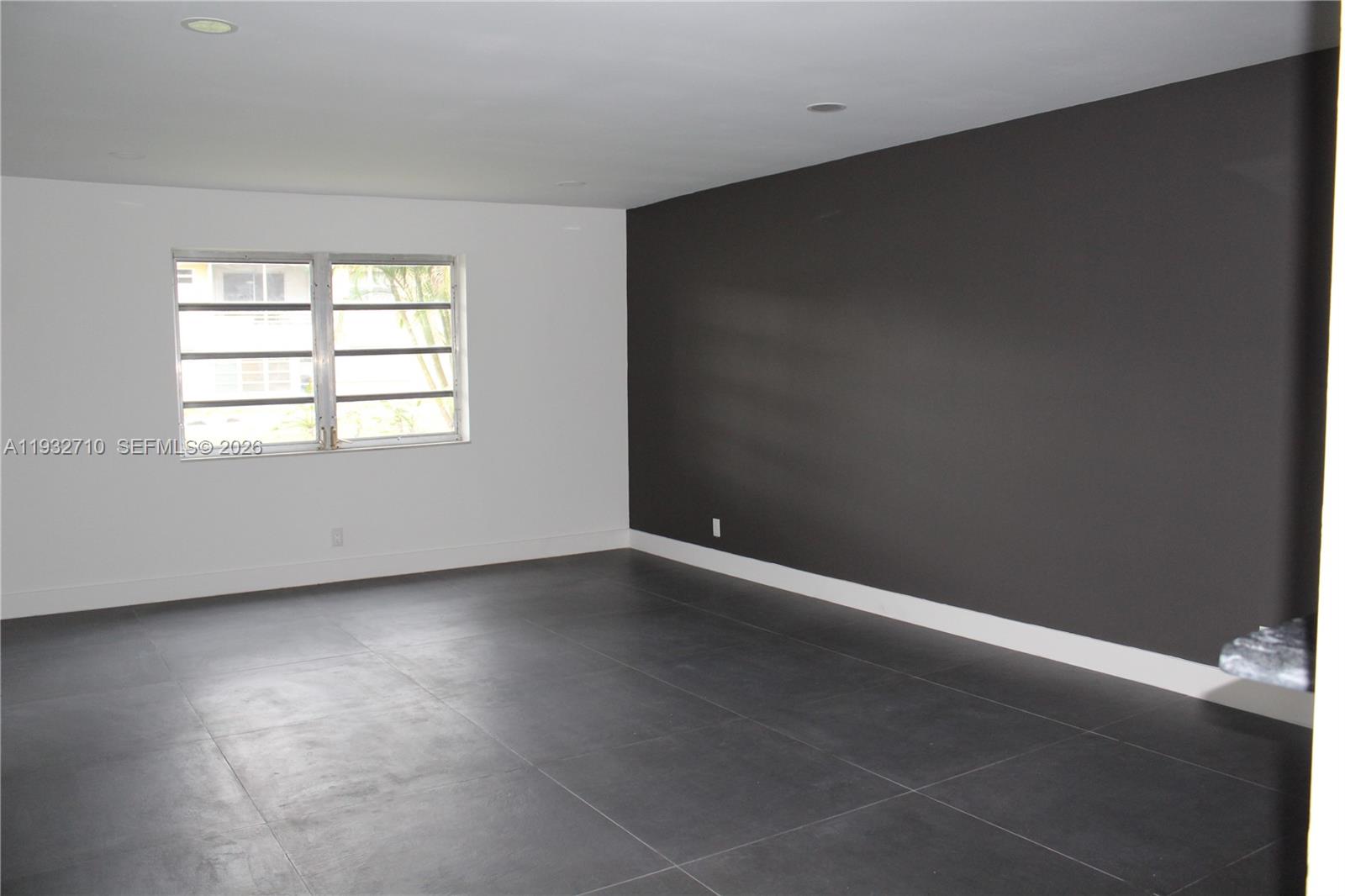 Open-concept living area at 5140 40th Ave - Condo in Dania Beach