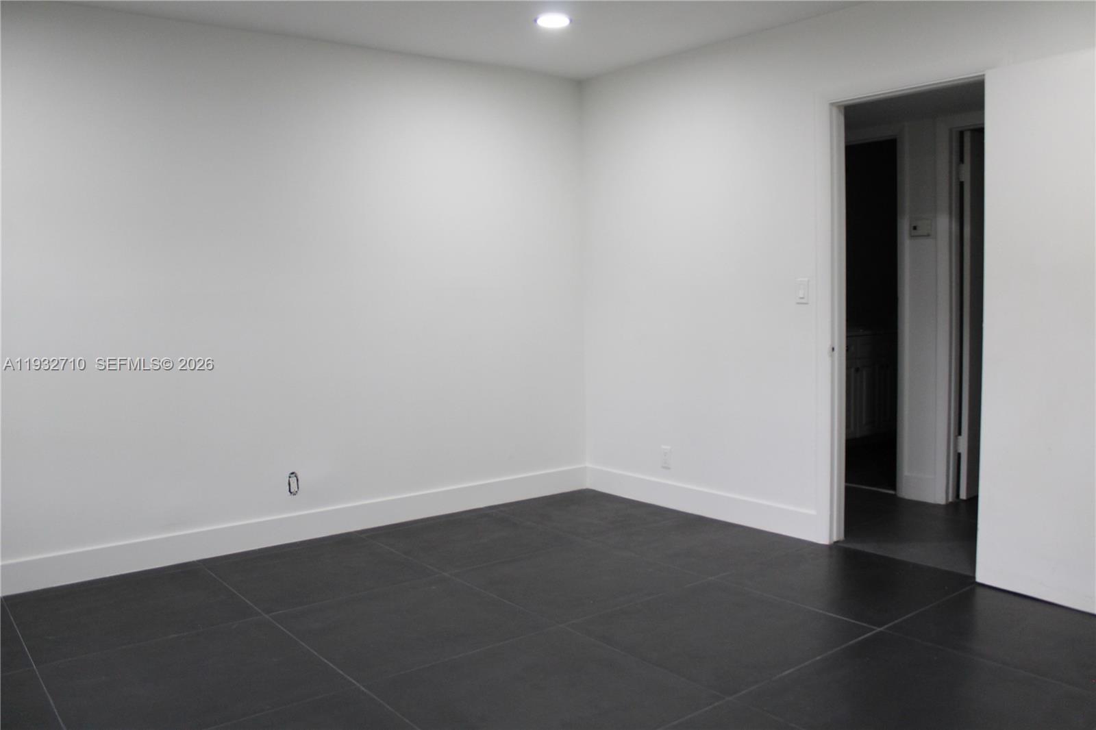 Open-concept living area at 5140 40th Ave - Condo in Dania Beach