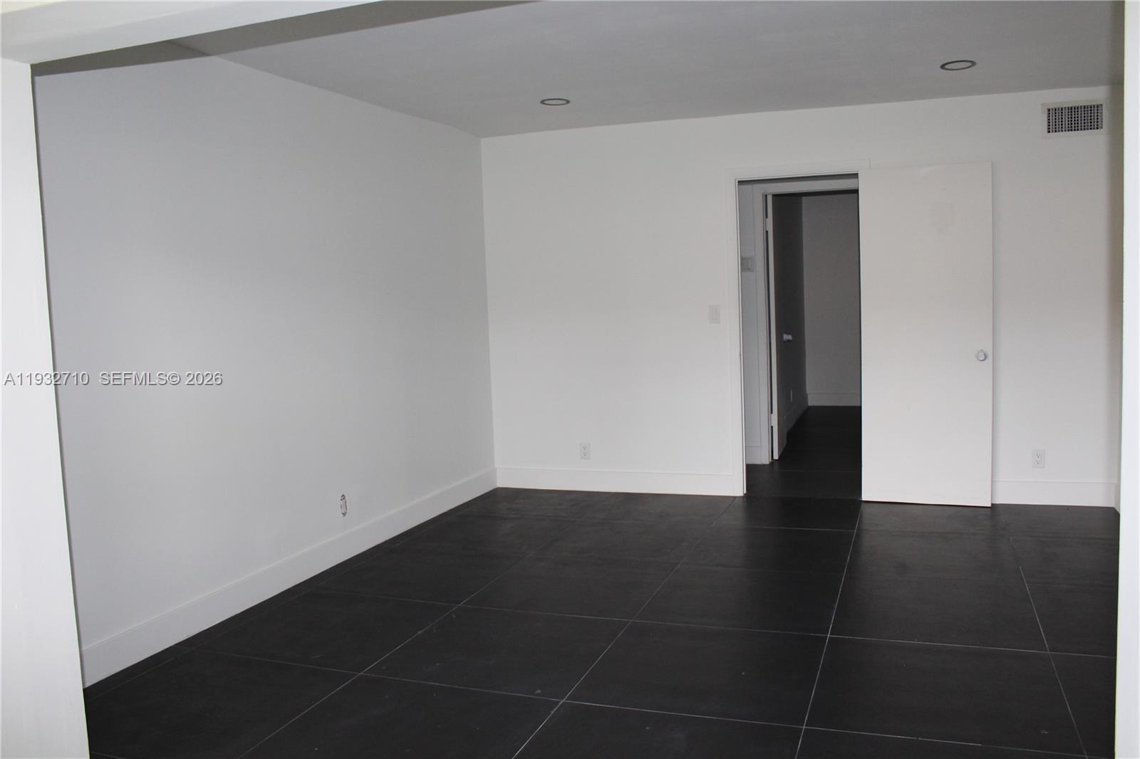 Well-appointed guest bedroom at 5140 40th Ave - Condo in Dania Beach
