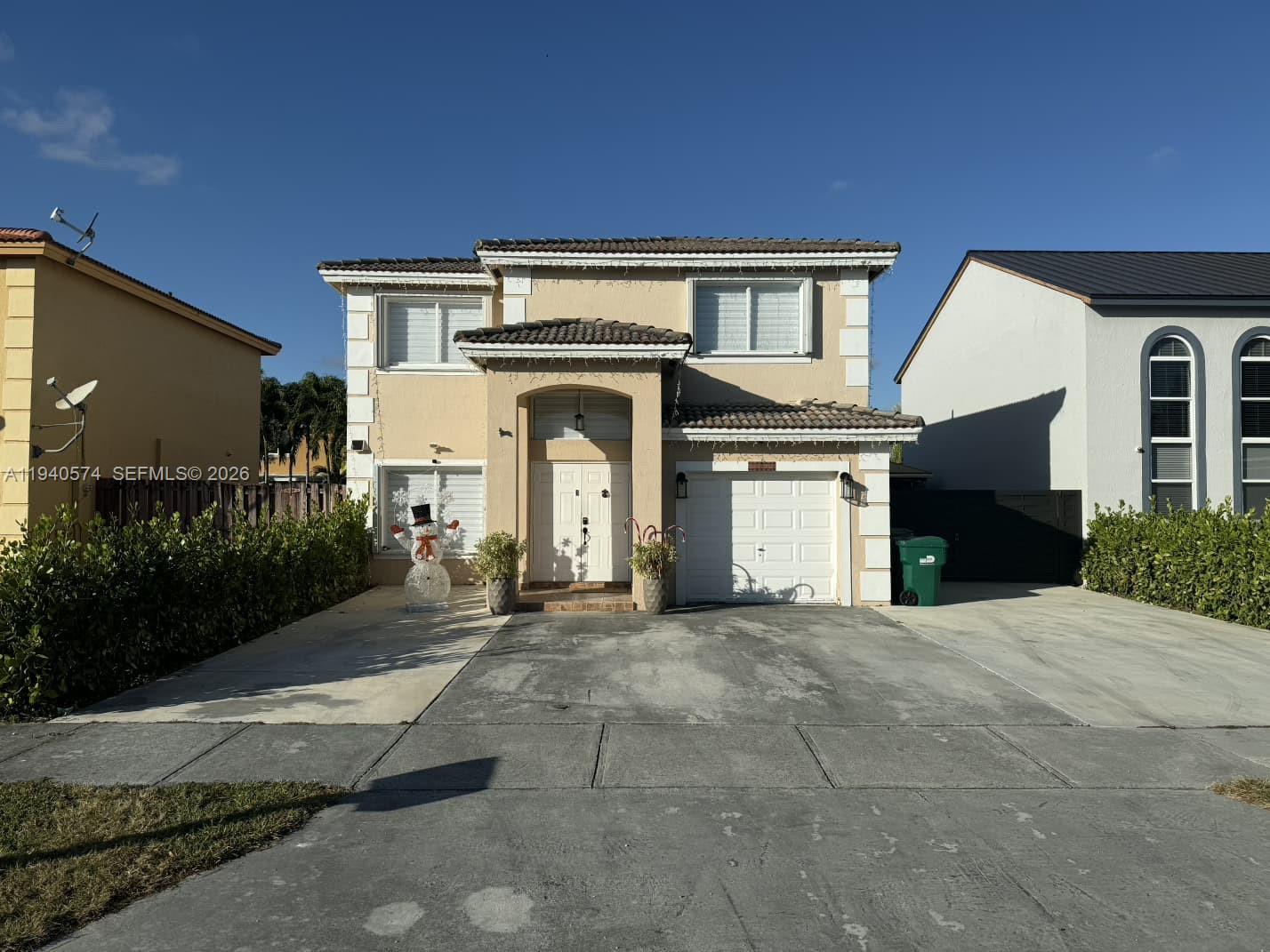 Welcome to this beautifully maintained two-story single-family residence, located in a peaceful community. This move-in-ready home offers 3 bedrooms, 3 fully remodeled bathrooms, and a 1-car garage, combining comfort and functionality. The first floor features tile flooring throughout and a modern kitchen equipped with stainless steel appliances and granite countertops. A desirable layout includes one bedroom and a full bathroom on the ground floor, ideal for guests or multi-generational living. The home boasts high ceilings, a bright and open living area, and a formal dining space perfect for everyday living and entertaining. The second floor offers durable luxury vinyl plank (LVP) flooring throughout the bedrooms, enhancing both style and durability.Step outside to an exceptional outdoor entertainment area, featuring a fully designed outdoor kitchen and three gazebos, creating multiple covered spaces ideal for hosting gatherings and enjoying Florida outdoor living year-round. Conveniently located with easy access to the Florida Turnpike, shopping centers, and supermarkets. With its functional layout, upgraded features, and prime location, this home presents a wonderful opportunity. Schedule your private showing today