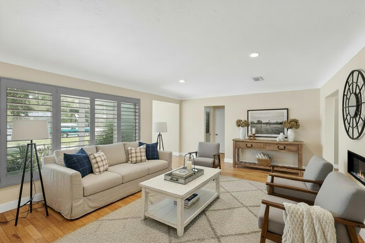 NEW PRICE!Experience refined living in the prestigious Albuquerque Country Club! This elegant home highlights upscale finishes in every detail. 2 spacious living rooms are separated by a striking gas fireplace, plus a flexible bonus room ideal for gym, office, or play, Brazilian walnut sliding door for privacy accented w/plantation shutters. Beautiful oak & tile flooring throughout. Gourmet kitchen shines w/custom soft-close cabinetry, quartz countertops, center island & pro-grade appliances. A butler's pantry offers convenience with sink, wine fridge, walk-in pantry, folding counter & ample storage. The primary suite is a peaceful retreat with spa-style bath & large walk-in closet. Enjoy the private casita (209/sf) w/half bath & mini-split. Owned solar provides added efficiency & savings