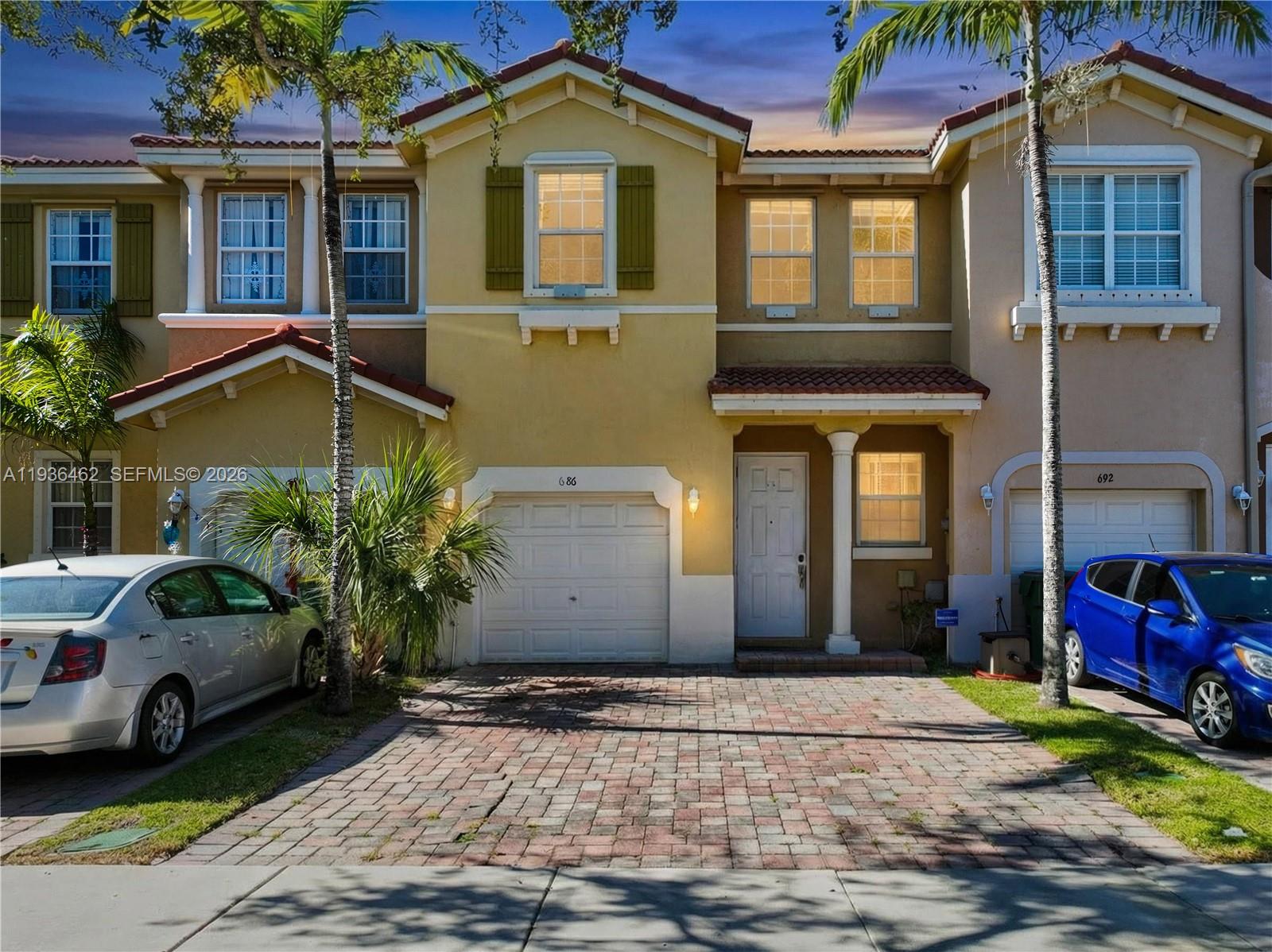 Welcome to this beautifully maintained 3-bedroom, 2.5-bath townhome in the gated community of Portofino Villas West in Homestead. This spacious residence offers a thoughtfully designed layout, featuring durable tile flooring throughout the first floor. The kitchen is equipped with stainless steel appliances, ample cabinetry, and generous counter space, ideal for both everyday living and entertaining. Upstairs, all three bedrooms are carpeted and filled with natural light. The primary suite features an en-suite bathroom with a soaking tub and a separate shower. Additional highlights include a one-car garage, a private driveway with space to park multiple vehicles, and ample storage throughout the home. Residents also enjoy access to community amenities, including a pool and clubhouse. Perfectly positioned for convenience, this home is just minutes from Homestead Baptist Hospital and Homestead Air Force Base, located right off Campbell Drive and adjacent to the Florida Turnpike. Schools, shopping, dining, and major commuter routes are all within easy reach.Don’t miss the immersive 3D virtual tour. Wherever you go becomes a part of your universe; make this place your home planet.