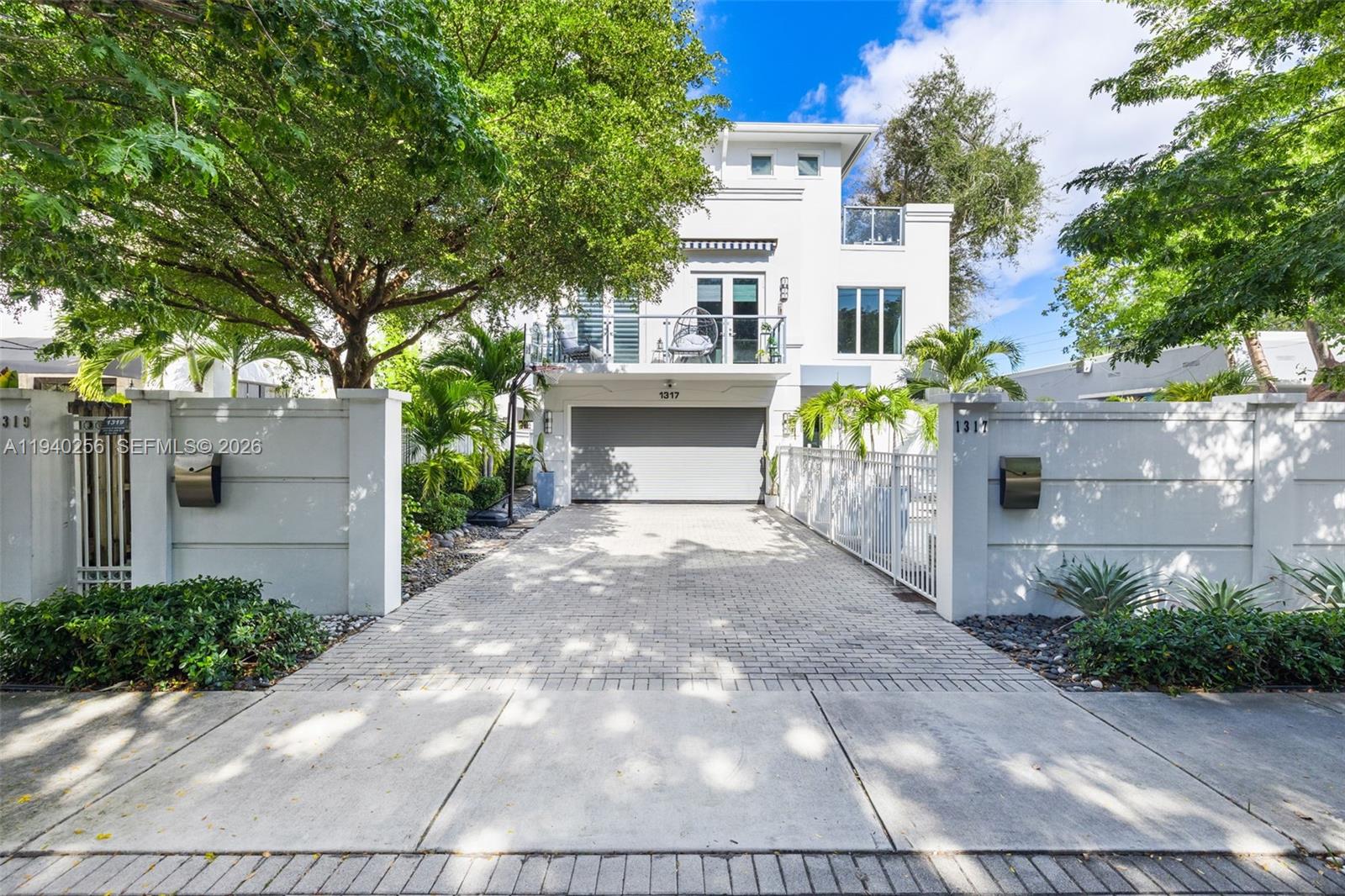 Introducing a rare Victoria Park offering that lives like a true single-family residence with an unbeatable location, steps away from Las Olas Blvd. This expertly maintained 3BD/3.5BA modern residence is designed for elevated living and effortless entertaining, offering sun-filled interiors, soaring ceilings, and a masterfully curated floor plan, blending the kitchen, living, & dining areas all on the 2nd floor. The expansive open living level is anchored by a chef’s kitchen with natural GAS range, dual islands, quartz countertops, and high-end appliances. The primary suite serves as a tranquil retreat with dual walk-in closets, a spa-inspired bath with separate tub & shower, and 2 private terraces. Additional highlights include a metal roof, walled courtyard with private pool, kitchen reverse osmosis water system, and a spacious 2-car garage with an oversized driveway for 4 additional cars. Just steps from Las Olas Blvd's world-class dining, shopping, and nightlife, and minutes from the beach and airport. This is truly a premier Victoria Park address defined by unbeatable walkability and effortless access to the best of Fort Lauderdale! No HOA.