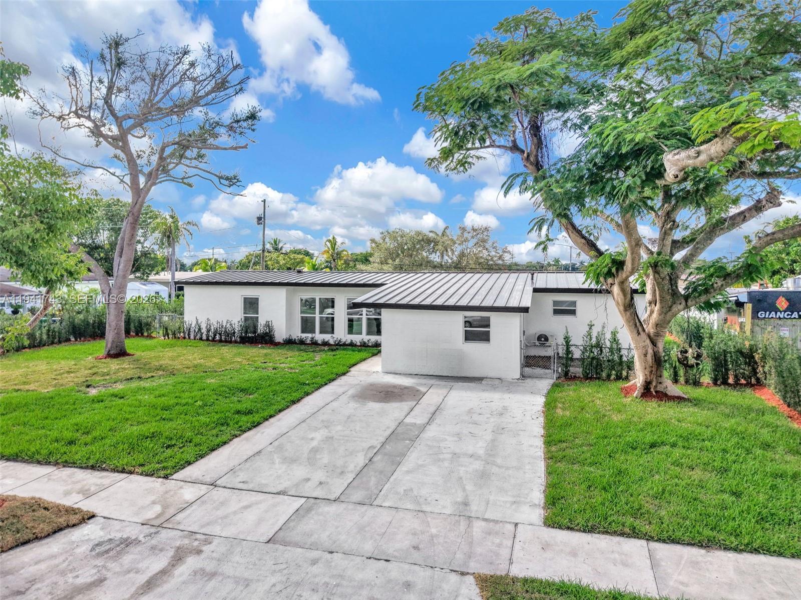 This Stunning Home has been completely updated Modern and turn Key ready to Move In from the Oasis feel of the pool to the spacious front and backyard has in-law quarters