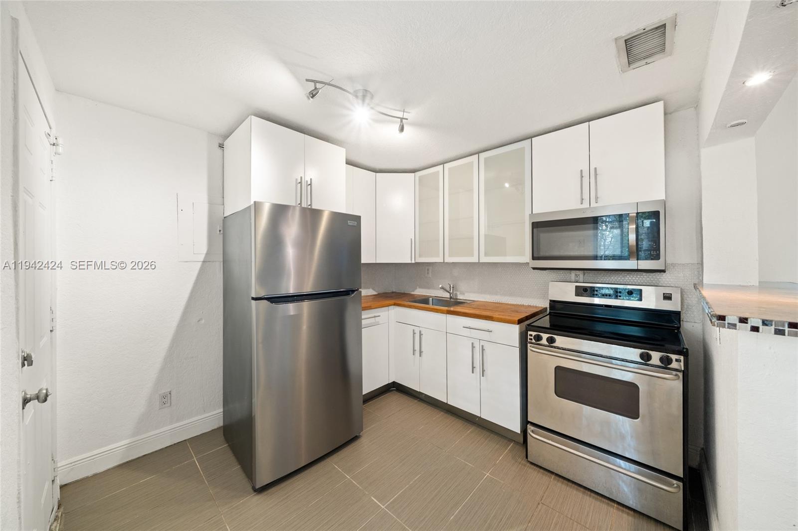 Welcome to this updated 2-bedroom, 1-bath residence located in the heart of Coconut Grove. This unit features a functional layout, complete with laminated wood-style flooring throughout, an updated kitchen, modern cabinetry and stainless steel appliances, and a renovated bathroom with contemporary finishes. Ceiling fans and central cooling enhance everyday living. The residence offers a practical floor plan, making it suitable for a variety of lifestyles. Laundry facilities are available on-site; the washer and dryer are not located inside the unit. Situated on a quiet residential street, yet conveniently close to parks, dining, shopping, and major roadways. Easy access to Coral Gables, Brickell, and Downtown Miami.