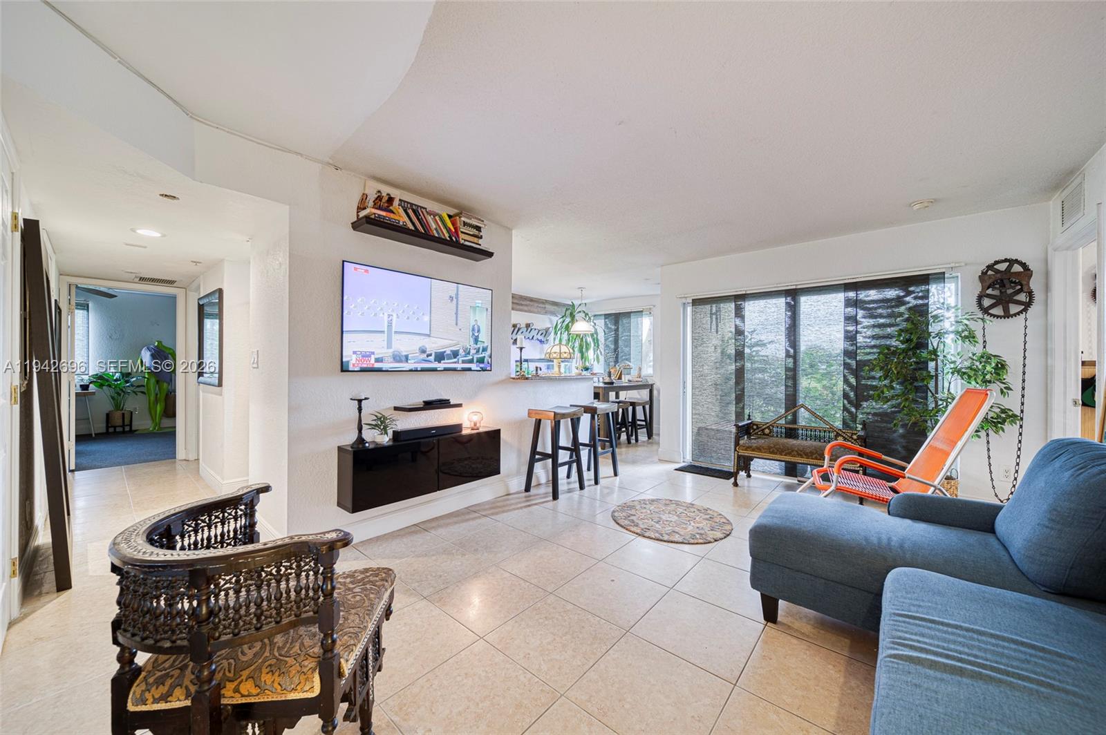 Bright ground-floor corner condo featuring 3 bedrooms and 2 bathrooms, with a private patio and direct water views. This residence offers a desirable split floor plan, breakfast nook/eat-in kitchen, walk-in closets, and spacious bedrooms. Enjoy the convenience of a full-size washer and dryer inside the unit, along with an additional private storage closet located just outside the front door. The unit has been freshly cleaned and painted, with professionally cleaned carpets and newer stainless steel kitchen appliances. Ideally located near Black Point Marina and scenic running and biking trails. Private, light-filled, and move-in ready.