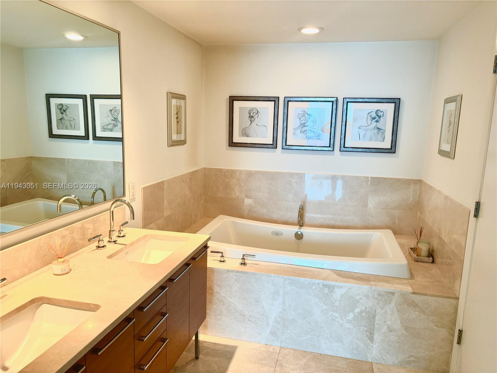 Spacious living room with panoramic views at 17001 Collins Ave - Condo in Sunny Isles Beach