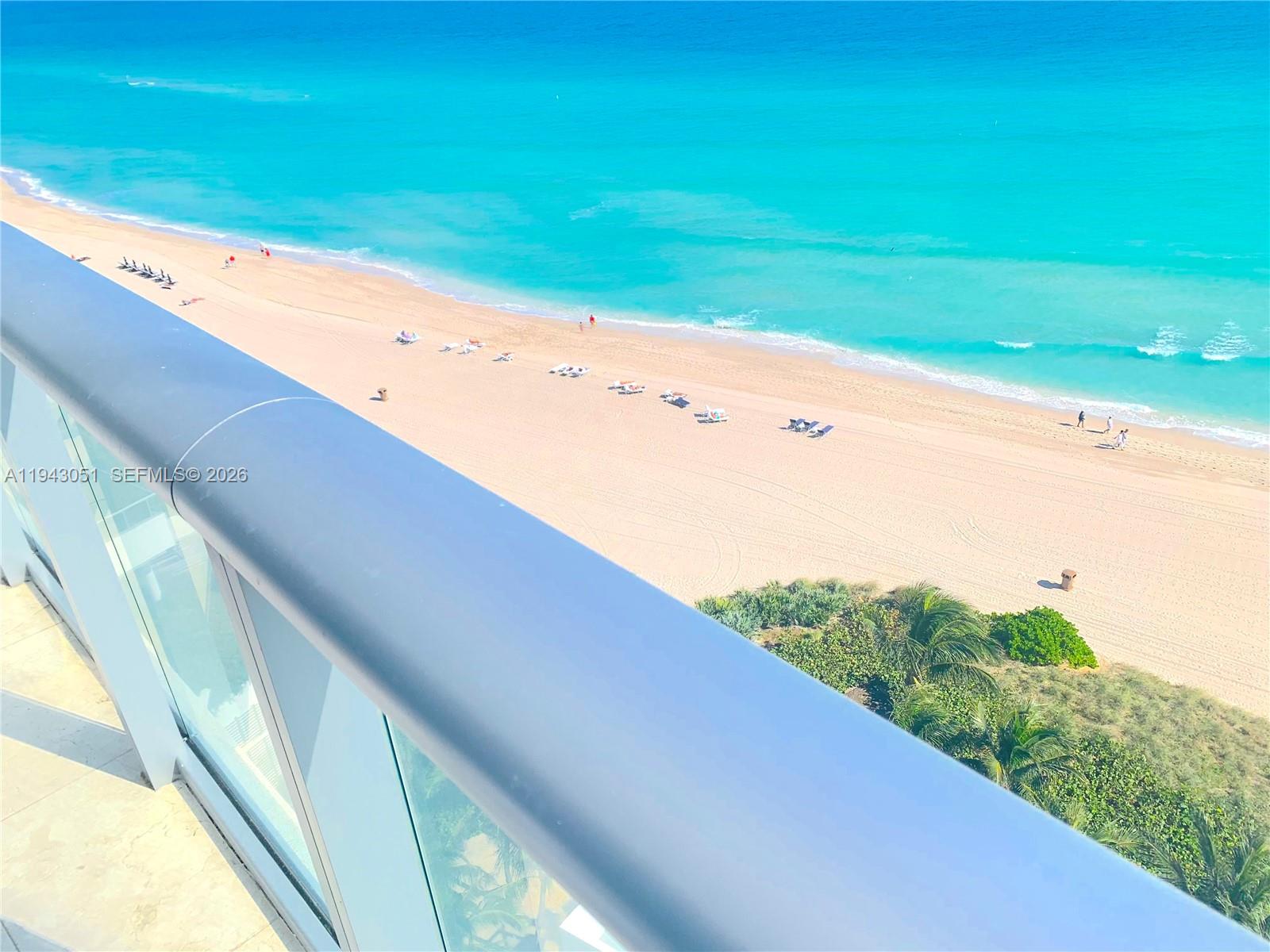 Spacious living room with panoramic views at 17001 Collins Ave - Condo in Sunny Isles Beach