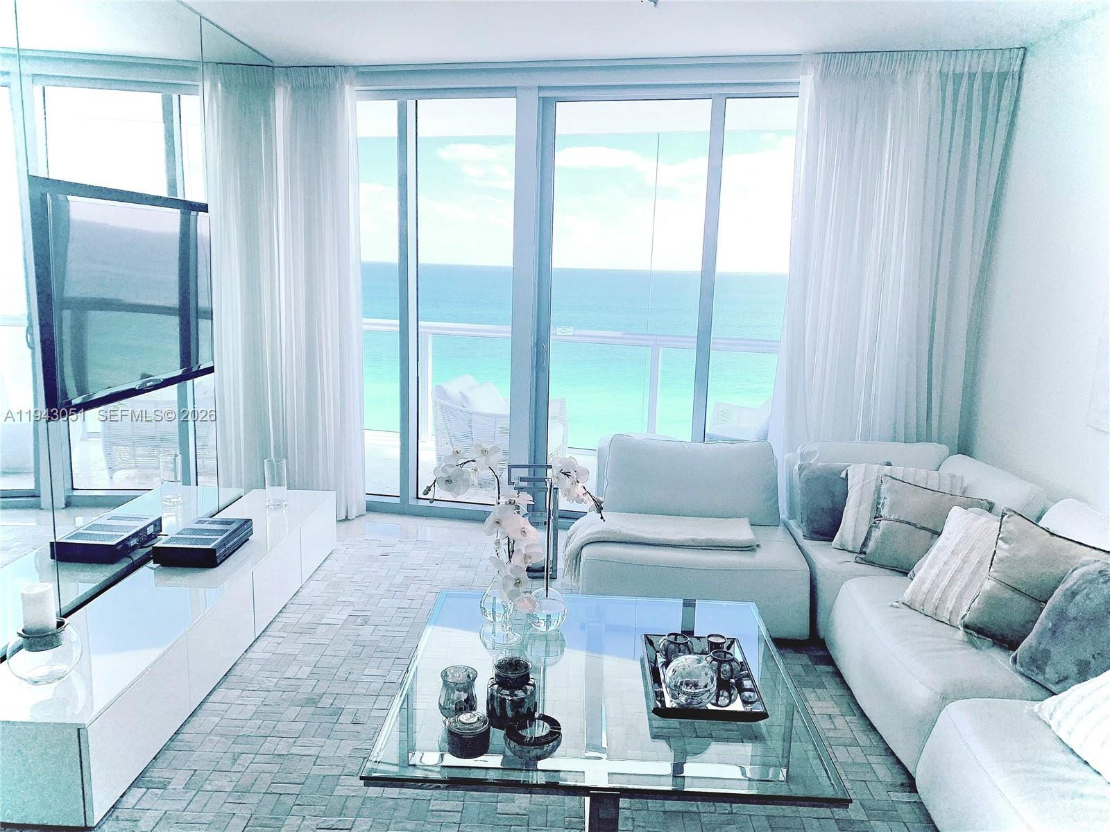 Modern kitchen with designer features at 17001 Collins Ave - Condo in Sunny Isles Beach