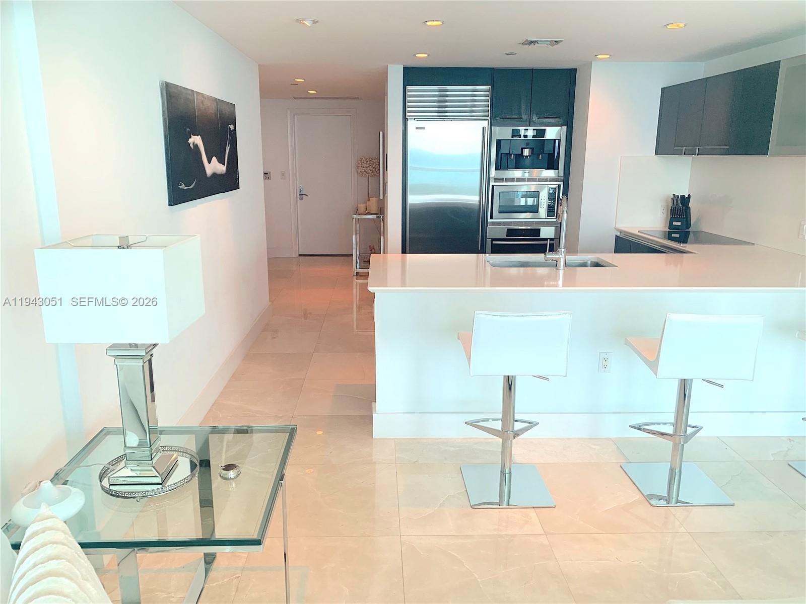 Well-appointed guest bedroom at 17001 Collins Ave - Condo in Sunny Isles Beach