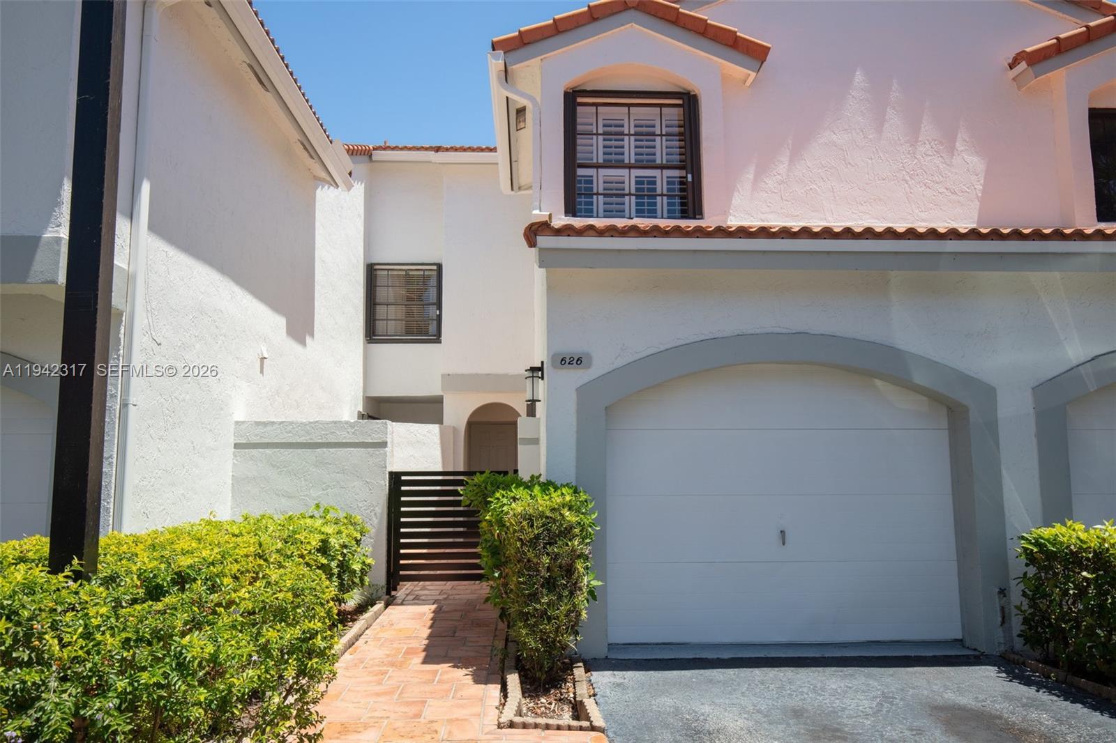 This beautifully remodeled townhouse offers 3 bed, 2 bath, and a powder room. Enjoy the brand new kitchen featuring modern cabinetry a sleek quartz ferrara counter top, and stainless steel appliances. The master suite boasts valued ceilings, a walking closet, and a spa inspired bathroom with skylight. Additional highlights include a private patio, an attached one car garage, and a driveway for extra parking. Located in a safe neighborhood, with excellent schools, this home provides easy access to Aventura Mall, Aventura circle, Don Soffer Exercise Trail, and a variety of shops and dining options, plus enjoy quick access to Waterways Marina and major highways.