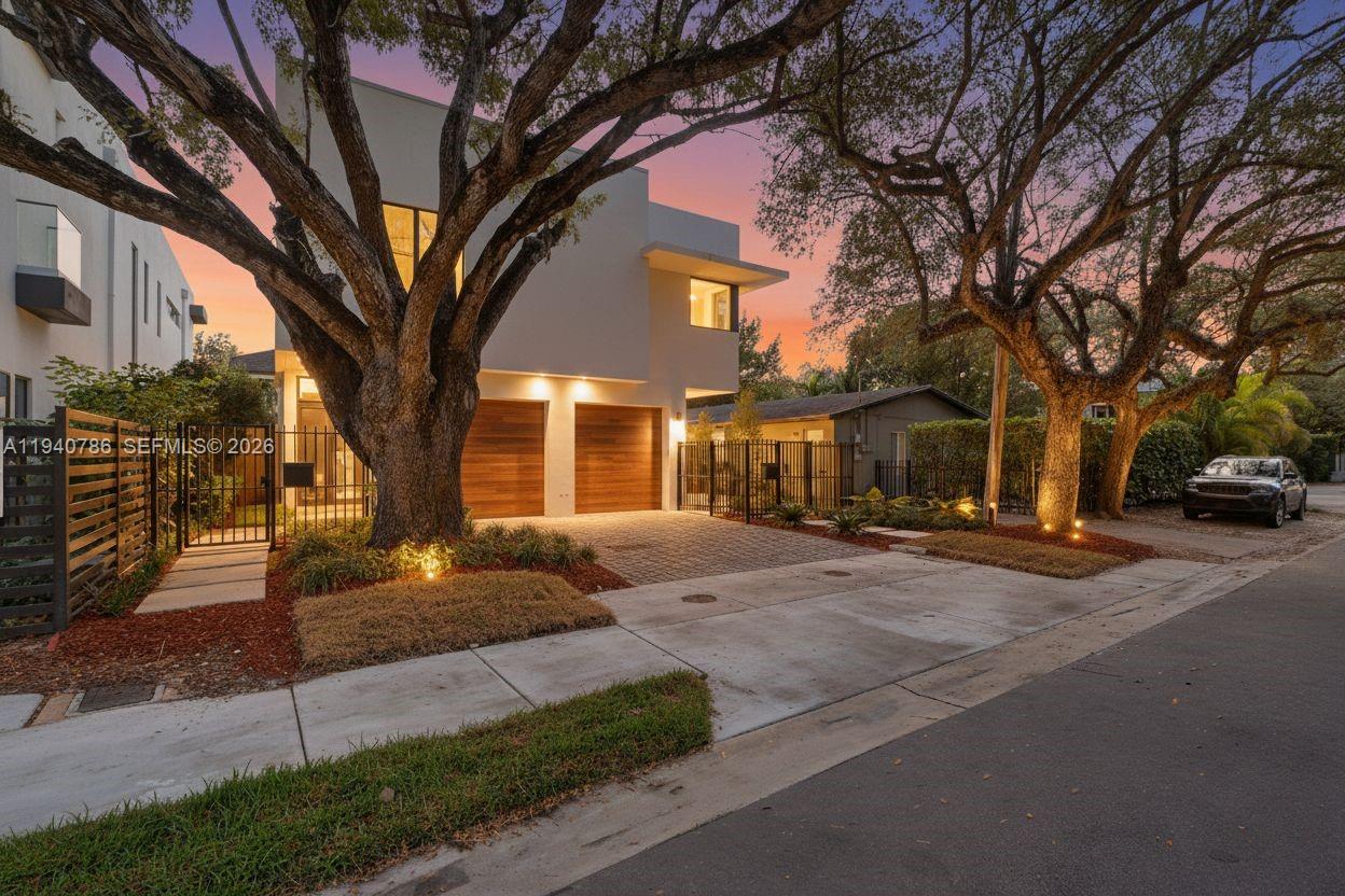 Located in the heart of Coconut Grove, this newly built townhome reflects the feel of modern luxury in one of Miami’s most iconic & highly desired neighborhoods. Created for those who value both style & function, the residence unfolds across two beautifully finished levels, offering over 2,200 total SFT of sun-filled, open-concept living. Floor-to-ceiling windows invite daylight to stream in, creating a seamless connection between indoors & out while showcasing the home’s contemporary designer finishes. At the center of the home, the sleek, chef inspired kitchen is as efficient as it is striking appointed with high end appliances, quartz countertops, & custom cabinetry that elevate daily living & effortless entertaining. The primary suite serves as a tranquil retreat, complete with its own balcony; ideal for relaxing beneath the Grove’s lush canopy. Outdoors, a walled backyard with a shimmering private pool transforms the home into a personal oasis. Enclosed garage & in-unit laundry enhance everyday ease. Coconut Grove’s vibrant lifestyle awaits tree lined streets, waterfront parks, boutique shopping, acclaimed dining, and easy access to major roadways coming together to offer a rare blend of urban energy and relaxed, family-friendly charm. This is more than a townhome; it’s a lifestyle defined by comfort, sophistication, with an unmatched location! NO HOA!! Move-in ready and easy to show. Ask about the 3-2-1 approved lender buydown. You get an interest rate as low as 3%!
