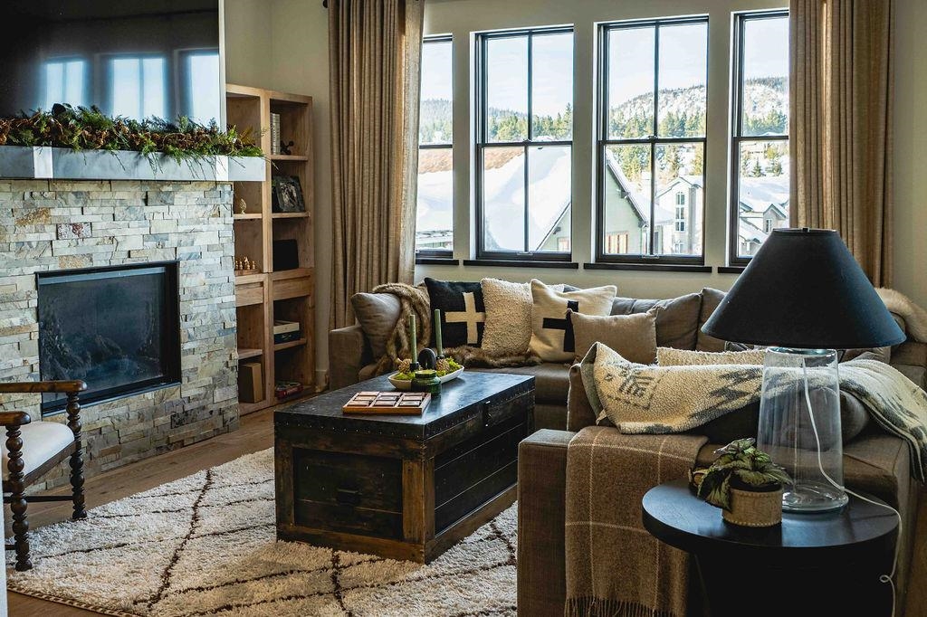 This stunning, 2022 townhome is beautifully decorated and ready to move in!  It is being offered furnished with a few exclusions. This Creekhouse townhome has one of the longest driveways in the development but don't worry about snow removal!  That and more is taken care of by the HOA.  Modern touches in this 3-bedroom, plus flex room and 3.5 bath unit includes energy efficient LED lighting, tankless hot water heater, electric car charger and custom metal and wood railings.  Quartzite countertops throughout and upgraded wood flooring make this property shine! Creekhouse is located near the Red Line shuttle system for convenient access to the slopes.