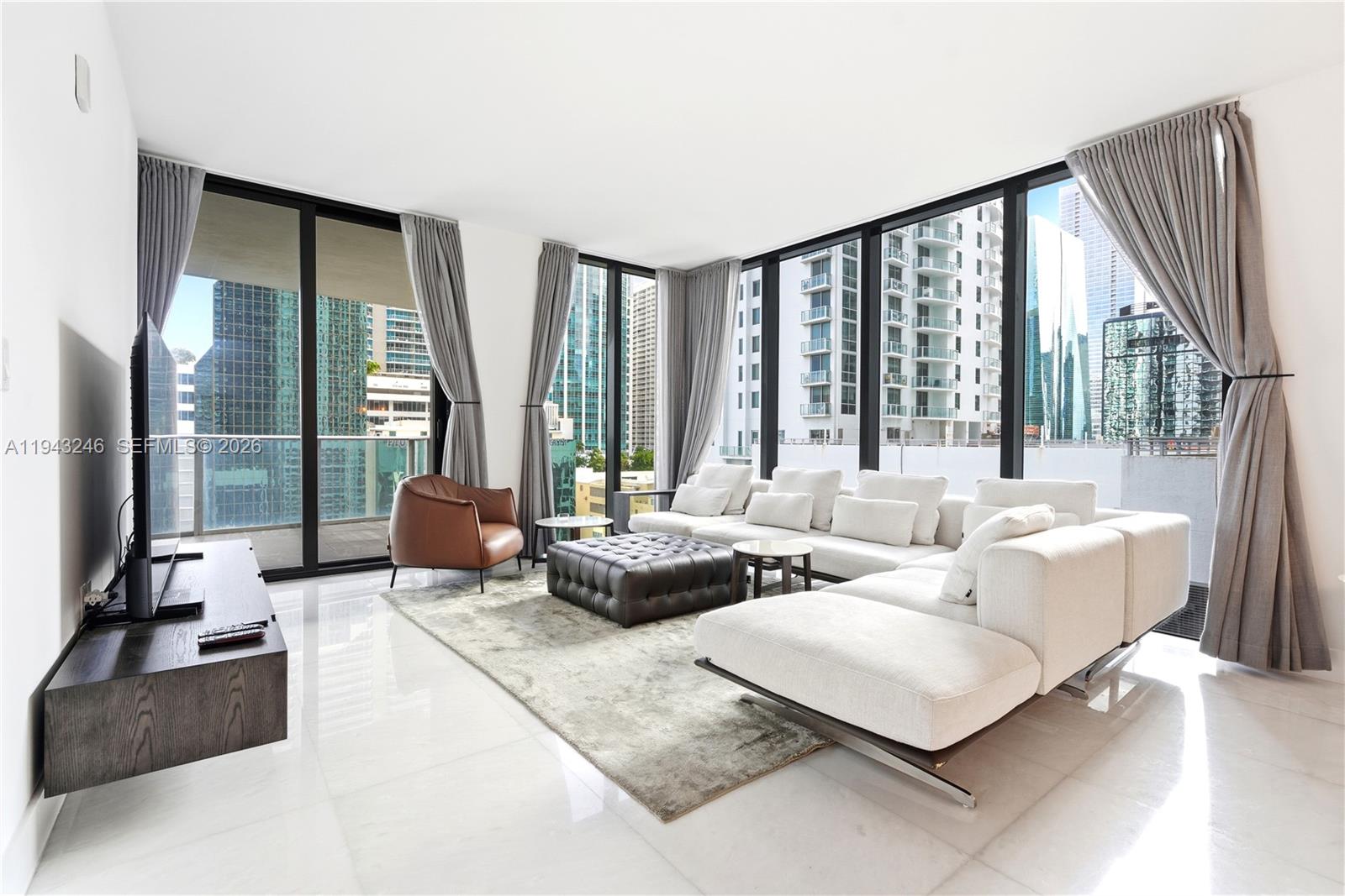 This unit offers a rare opportunity to lease a corner residence in one of Brickell’s most desirable luxury and full amenities buildings. This 3-bedroom plus den, 3-bath unit features floor-to-ceiling glass, panoramic city and partial bay views, a modern open layout, high-end kitchen appliances, spacious bedrooms, an oversized balcony and a private elevator. Enjoy resort-style amenities including indoor and rooftop pools, a state-of-the-art fitness center, yoga room, spa, indoor basketball and squash courts, children’s play areas, business center, and 24-hour concierge. Located steps from Brickell City Centre and Mary Brickell Village, with walkable access to dining, shopping, and entertainment.