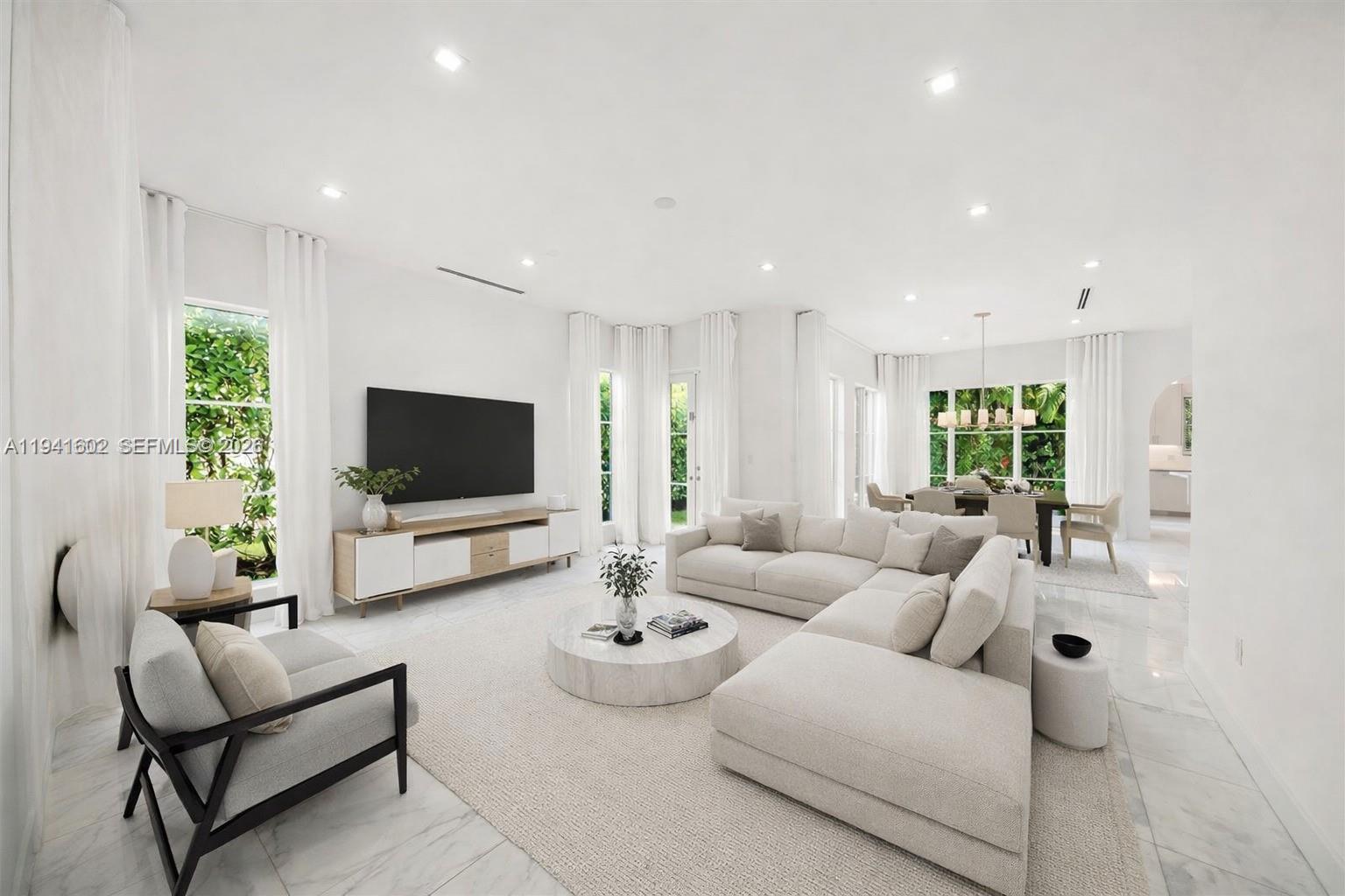 The absolute best value for a modern newly constructed luxury 2-story townhouse at Villa Blanc. 4 Bedrooms and 3.5 bathrooms. Located in the heart of Coral Gables, surrounded by exciting retail and restaurants. Walking distance to The Plaza, Miracle Mile, and Giralda. The unit features a ultra luxury high end finishes, high ceilings, private pool; turfed in backyard courtyard; multiple balcony terraces; open spacious floor plan; large hurricane-impact resistant windows; gourmet kitchen with high-end appliances and custom white wood cabinets; marble floors; Designed by award-winning architects Zeb Jorosz. Best Value for modern luxury in Coral Gables. Feels like a house.