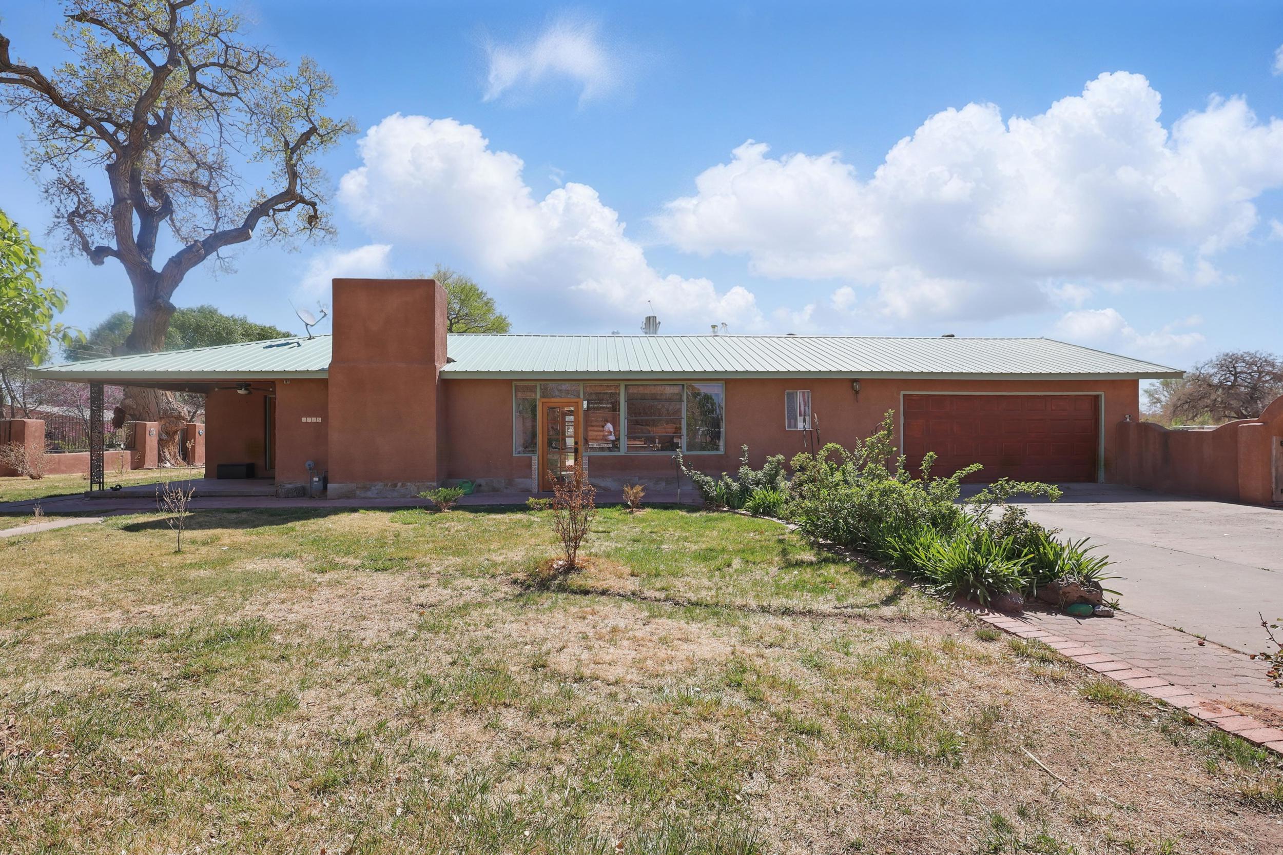 Listed at appraised value W/$5,000 closing cost assist - functional mini-farm offers true country living on 3.09 acres with Pre-1907 Water Rights, RGCD water rights, and laser-leveled land. The 3-bedroom, 2-bath home features two cozy living areas, warm wood flooring, a sunroom filled with natural light, and a 2-car garage. There's plenty of room for animals and growing--bring your livestock, chickens, and garden plans. The property includes backyard access for an RV or trailer, a bird roost, corral, hay storage, and a versatile storage area. A perfect place to live close to the land with space to roam and grow. Spring into action now and be ready to enjoy summer living on your own mini-farm. Additional 1.4277 acres to the east can be purchased in conjunction with the  home - MLS 109671
