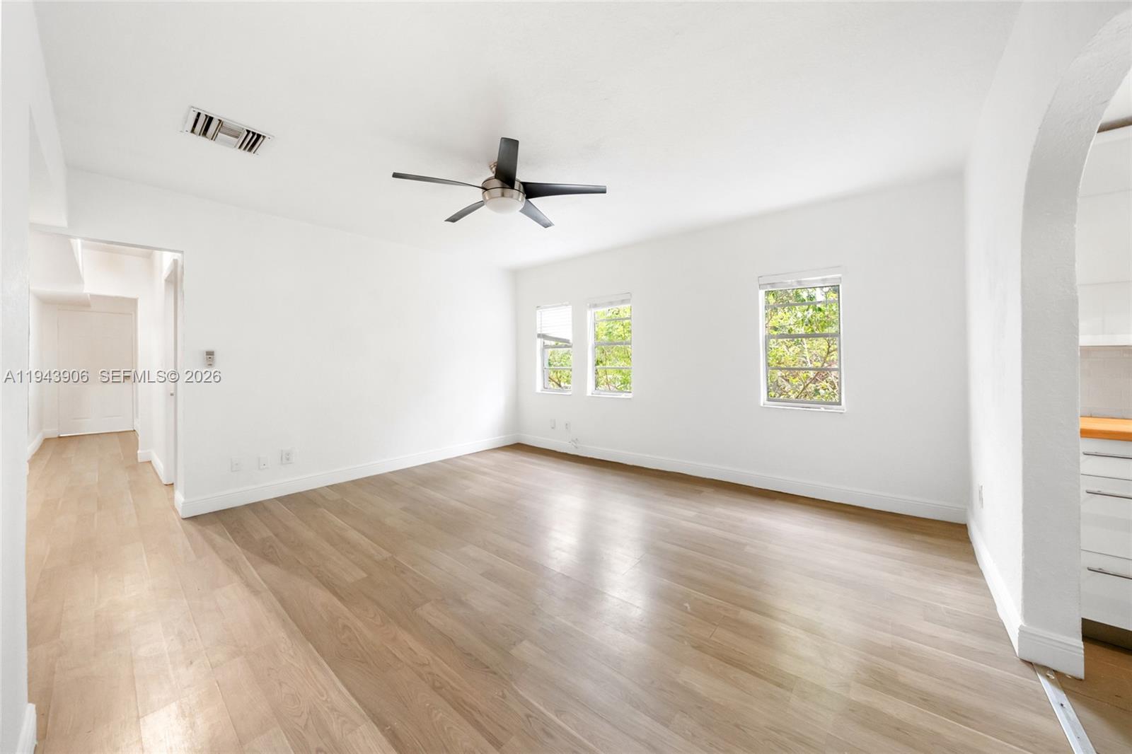 Welcome to this light-filled 3-bedroom, 1-bath residence located in the heart of Coconut Grove. This unit features an open concept layout, complete with laminated wood-style flooring throughout, an updated kitchen, modern cabinetry, and stainless steel appliances, as well as a renovated bathroom with contemporary finishes. Ceiling fans and central cooling enhance everyday living. The residence offers a practical floor plan, making it suitable for a variety of lifestyles. Laundry facilities are available on-site; the washer and dryer are not located inside the unit. Situated on a quiet residential street, yet conveniently close to Coconut Grove's parks, dining, shopping, waterfront and entertainment. Located near major roadways. Easy access to Coral Gables, Brickell, and Downtown Miami.