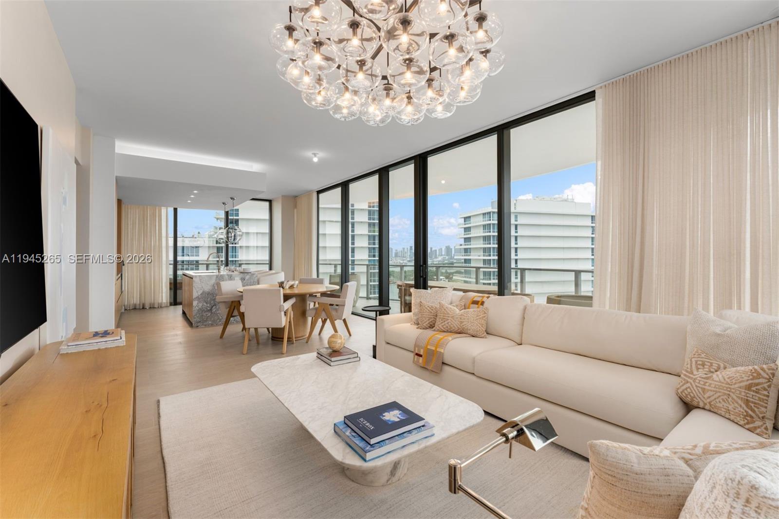 Just bring your toothbrush! Fully furnished, turnkey 3 bedroom, 3.5 bath residence at Five Park offers a rare combination layout with a spectacular 1,000 square foot terrace and breathtaking 180 degree views of Biscayne Bay and the Atlantic Ocean. Private elevator entry, an open chef’s kitchen, and expansive living spaces. The primary suite is complemented by one of the most impressive walk-in closets, designed for elevated everyday living. Located in the heart of South Beach, the building is within walking distance of top restaurants, Whole Foods, the marina, and shopping on Lincoln Road. Enjoy world class amenities including a spa and wellness center, state of the art fitness facility, co-working spaces, concierge and valet services, screening room, café, and exclusive access to a residents only beach club in South of Fifth. Experience elevated luxury living at Five Park, South of Fifth’s newest architectural landmark.