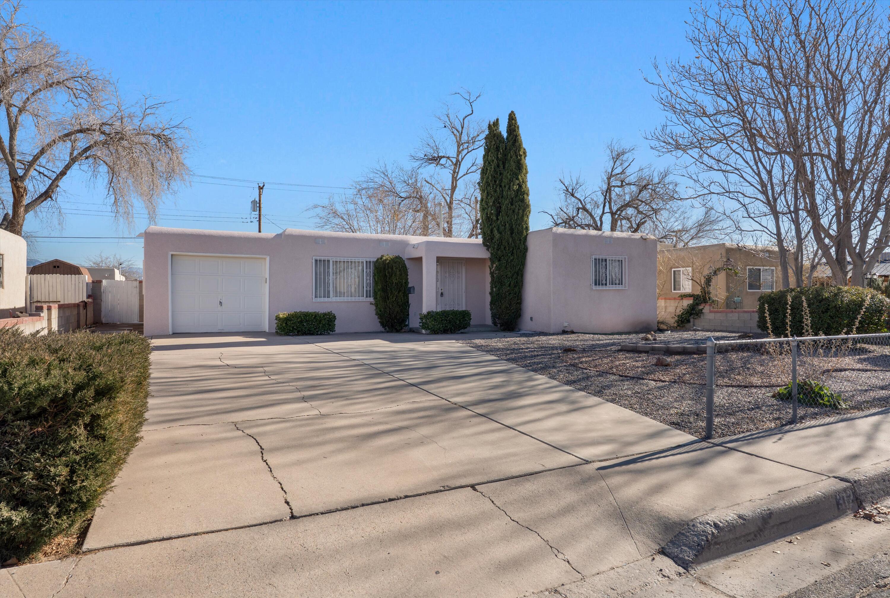 Welcome to this well maintained home with convenient access to I-40. This home has numerous improvements including a TPO roof, new heating/cooling systems with refrigerated AC, and a new water heater. Great floor plan with an attached 1 car garage.  Large backyard with a covered patio, and 2 storage sheds.  In addition to the above, the property underwent an extensive renovation 30 years ago which included fully insulated exterior walls as well as updated plumbing and electrical throughout.  Windows have been updated too which help keep the home comfortable year round. Come see this affordable move in ready home today!