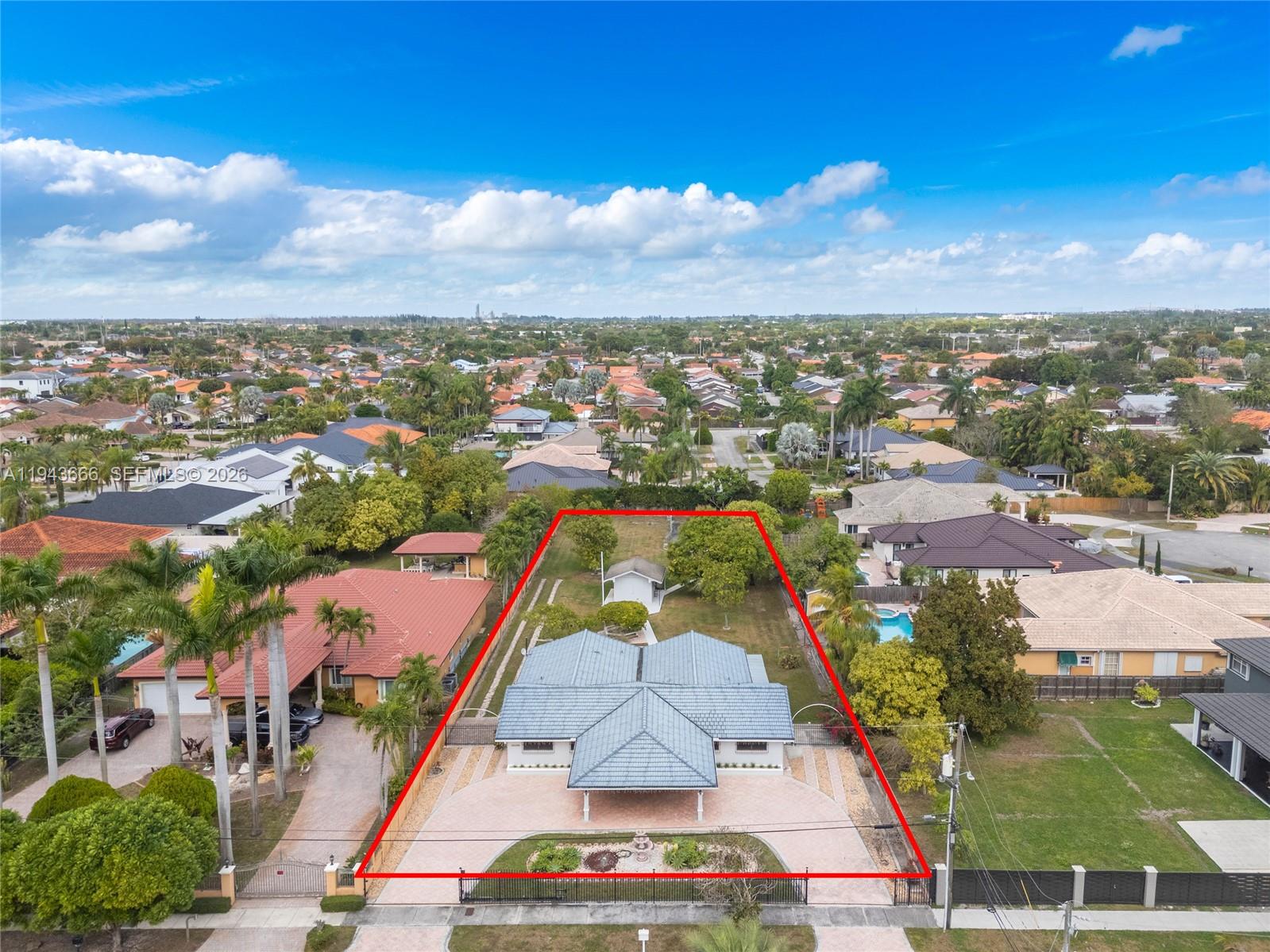 Rare opportunity to own this meticulously-kept home on an oversized 27,660 sq ft lot in one of Southwest Miami’s most desirable neighborhoods. This 3-bedroom, 2-bath residence offers an expansive layout, spacious circular driveway and side property access, perfect for a boat or RV. In pristine condition, this home on a 0.6 acre lot brings endless potential—perfect for a resort-style pool, outdoor entertaining, or future expansion. No HOA. Prime location close to major highways, top schools, shopping, and dining