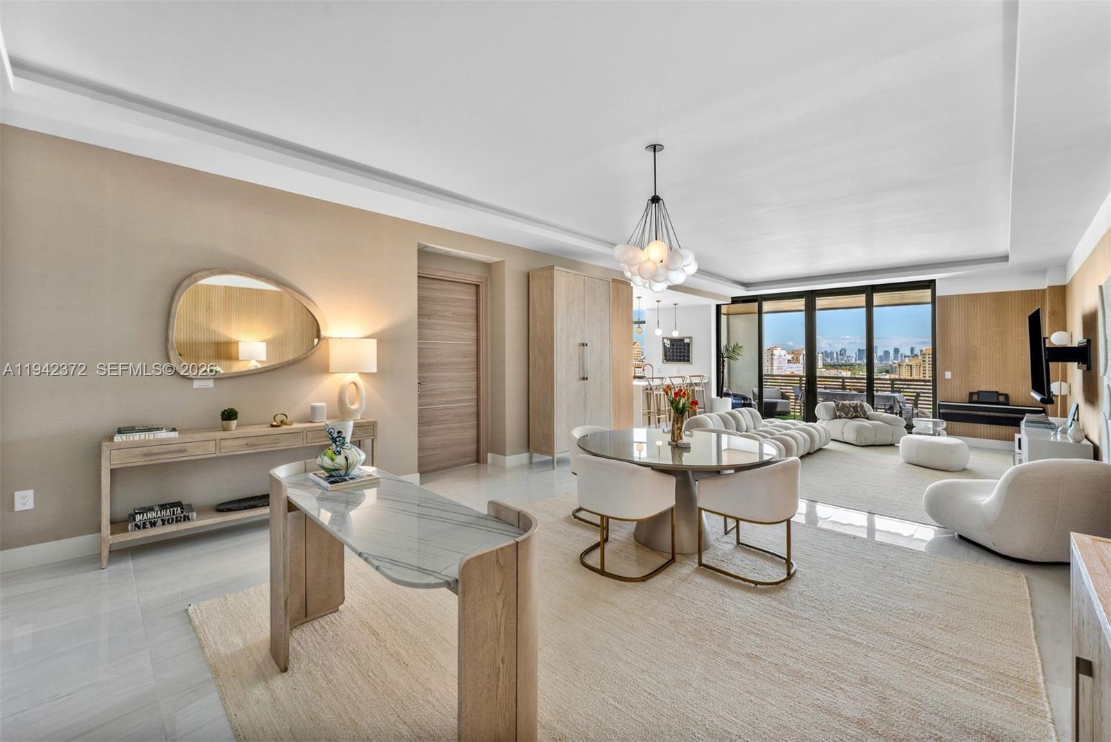 This elegant 3,020 SF residence at Villa Valencia offers refined boutique living in the heart of Coral Gables, featuring a spacious 4-BD, 4.5-BA layout and a rare private pool deck cabana. One of only 39 residences across 13 stories designed by Hamed Rodriguez Architects, the home delivers privacy, beautiful views, and thoughtful design throughout. Interior highlights include a private elevator foyer, 10-ft ceilings, full-height impact glass, European white oak millwork, polished Monaco Blanco porcelain floors, custom closets, whole-home air and water purification, and Lutron lighting. The gourmet eat-in kitchen is equipped with Italkraft cabinetry, quartz countertops, and premium Wolf, Sub-Zero, and Asko appliances. Expansive balconies and a covered terrace with summer kitchen enhance indoor-outdoor living. A standout feature is the residence’s assigned pool deck cabana complete with a full bathroom, wet bar with icemaker, private hot tub, and dedicated lounge area, providing unmatched convenience and privacy for entertaining or relaxing poolside. The unit, offered partially furnished, includes two ground-floor garage spaces. Residents enjoy world-class amenities including a 78-ft resort-style pool, spa and wellness center, state-of-the-art fitness facilities, entertainment and party spaces, golf and driving simulator, library, dog park, valet service, 24-hour security, and lushly landscaped grounds—just minutes from fine dining, golf courses, top schools, and the airport.