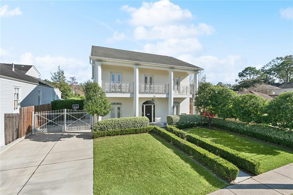Old Metairie opportunity! Situated near the sought-after Metairie Club Gardens neighborhood, this beautifully maintained home offers approximately 3,919 square feet of refined living space with thoughtful renovations completed in 2017 and 2021. Built in 2005, the residence features 10-foot ceilings on the first floor and 9-foot ceilings upstairs, complemented by elegant crown molding, custom closets, and abundant storage throughout.The first-floor primary suite provides a private retreat with two walk-in closets and a spa-like bath featuring marble countertops, a marble shower, and separate tub. Designed for both everyday living and entertaining, the spacious family room opens through French doors to a large covered patio and private backyard. The open-concept kitchen is equipped with high-end Viking and GE Monogram appliances, generous cabinetry, and a pantry, while a stylish powder room with quartz countertops completes the main level.Upstairs, you’ll find four additional bedrooms with renovated bathrooms, along with a convenient second-floor laundry room with sink. The third-floor bonus room is ideal for entertaining or multi-purpose use, offering a full bath, wet bar with wine cooler and ice maker, extra storage, and walk-in attics. Additional highlights include Sonos speakers throughout key living areas, a smart thermostat, updated alarm system, three HVAC units, and two tankless water heaters. Outdoors, the property is fully landscaped with lighting and an irrigation system, and features an electric driveway gate with electric vehicle charging readiness—combining comfort, technology, and timeless style in a premier location.