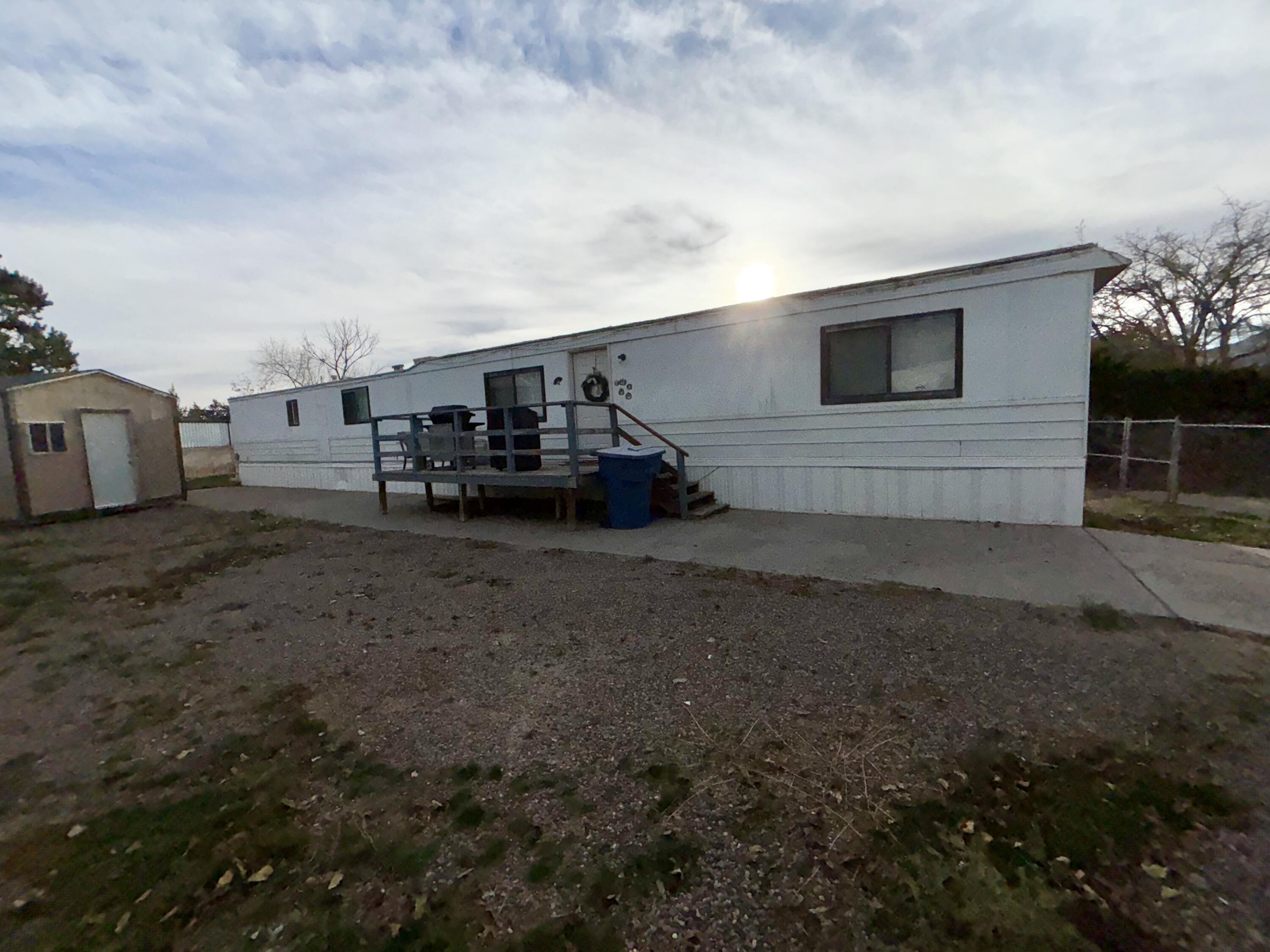 Awesome location and great price! This 2 bedroom, 2 bath mobile home is on a .19 acre lot. Shed stays. Quick access to I-25 and walking distance to stores and restaurants. Seller will consider financing.