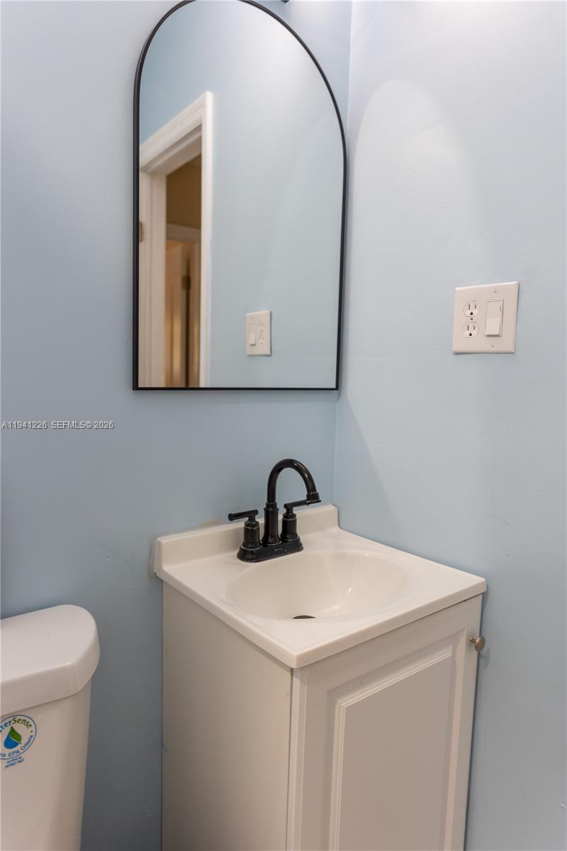 Elegant master bedroom retreat at 250 14th Way - Home in Dania Beach